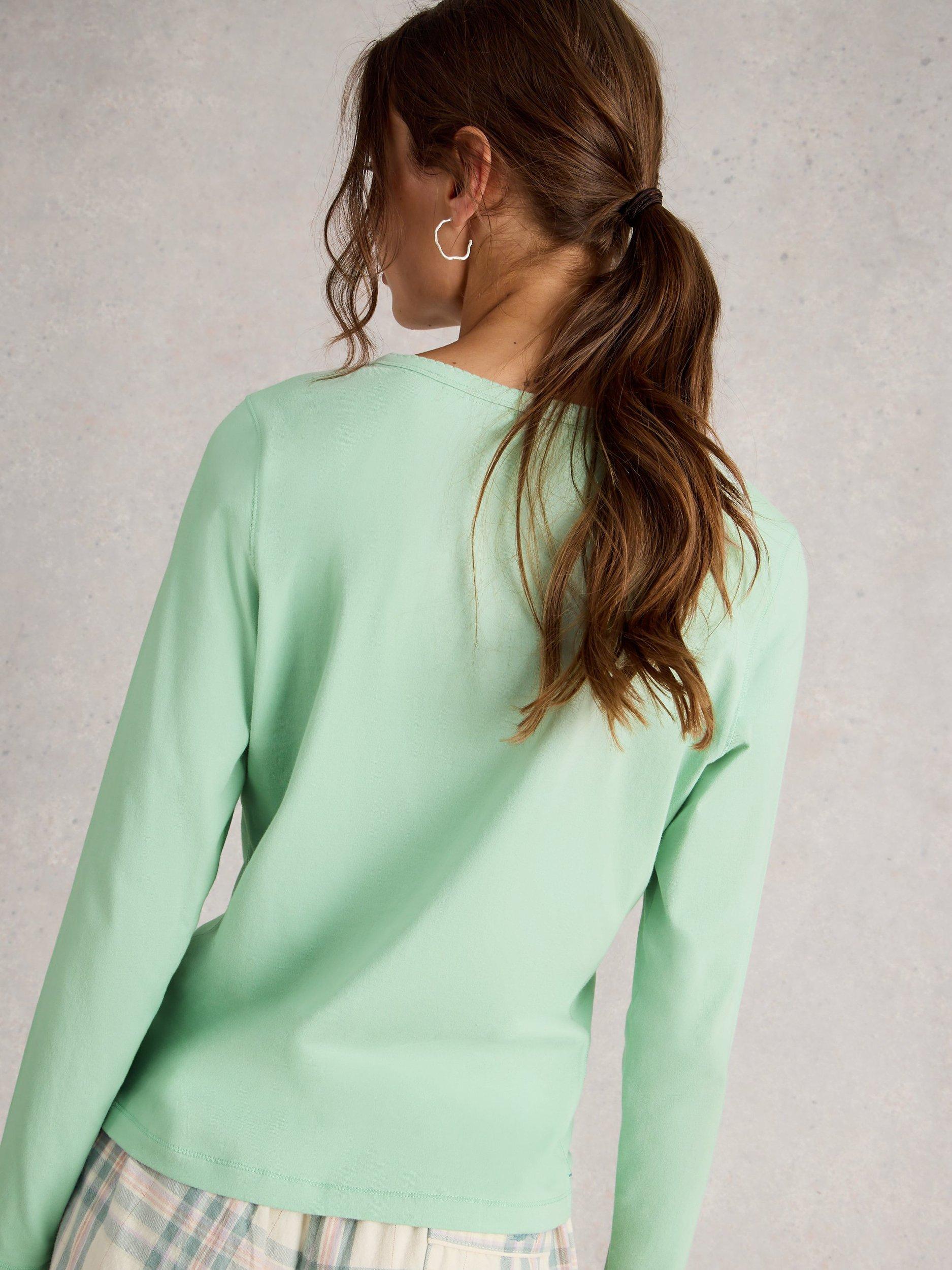 Product image 2 of 6, which shows White Stuff Penny Cotton Blend Long Sleeve Button Neck Pyjama Top, Light Green, XL