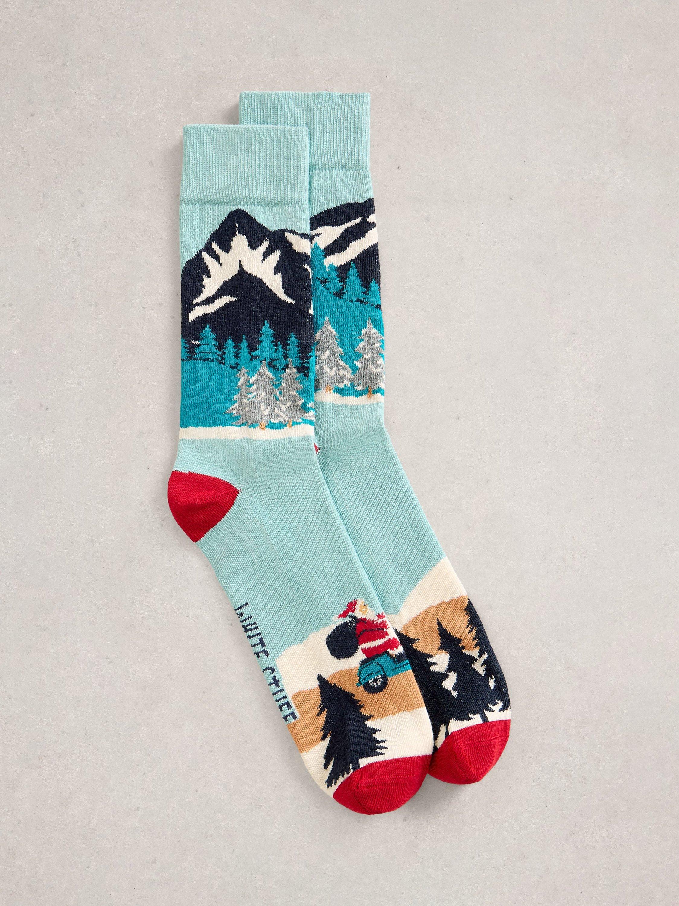 Product image 2 of 3, which shows White Stuff Driving Santa Cotton Blend Socks, Blue/Multi, 9-12