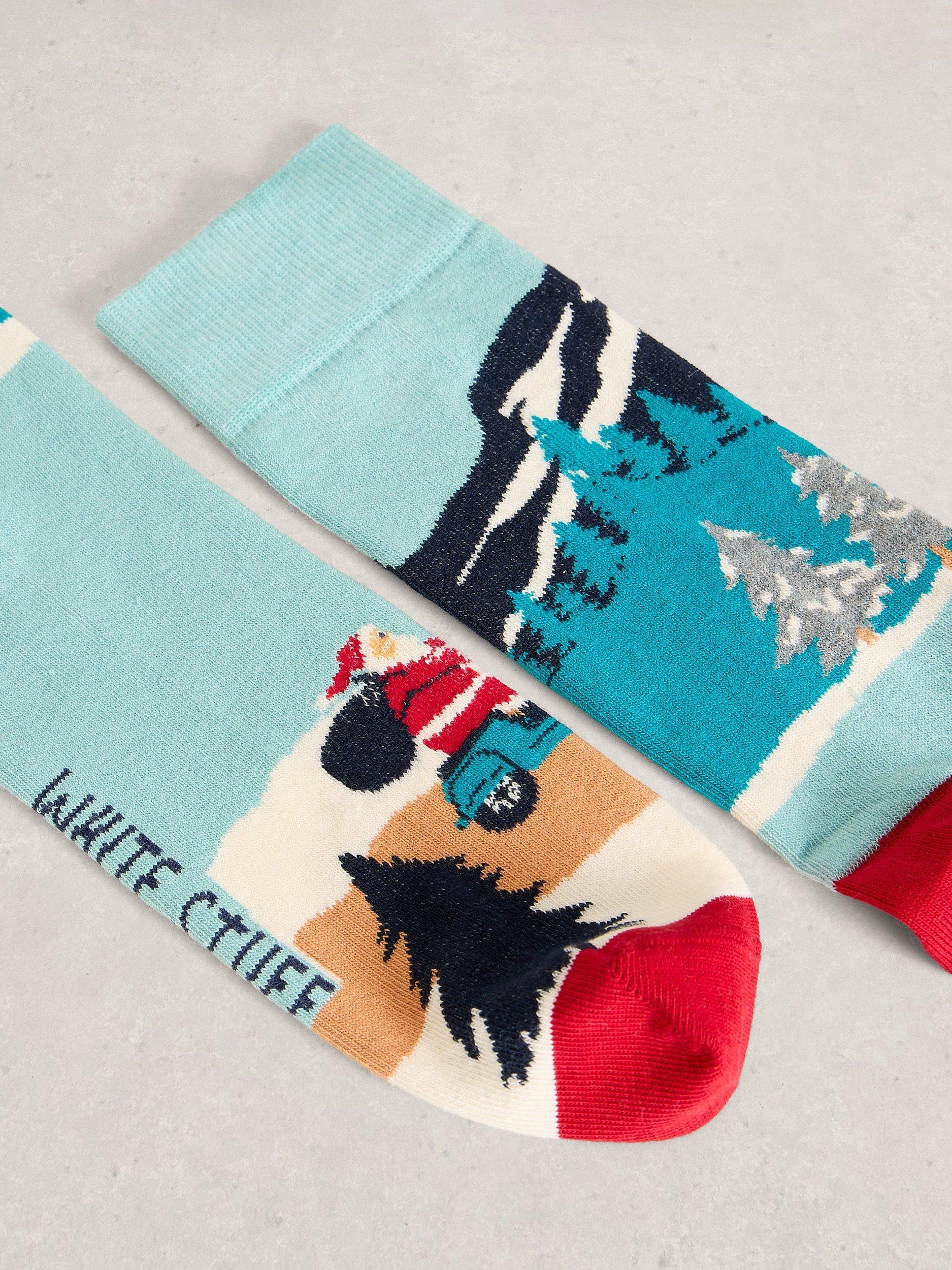 Product image 3 of 3, which shows White Stuff Driving Santa Cotton Blend Socks, Blue/Multi, 9-12