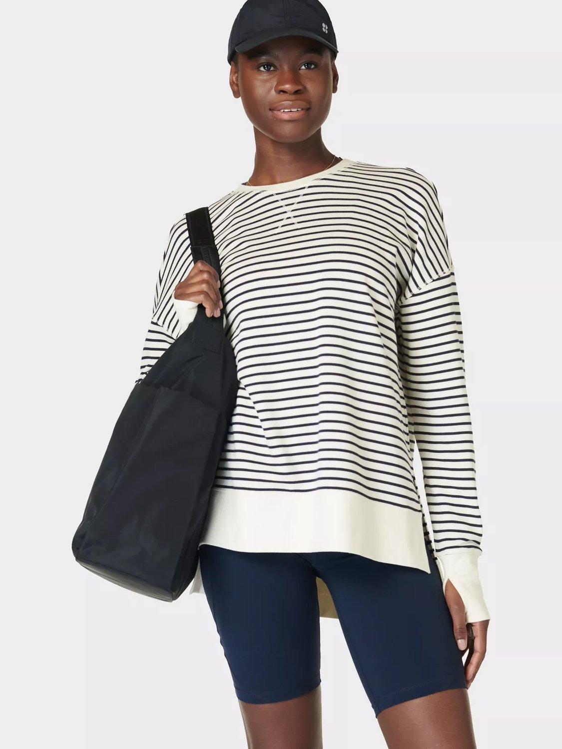 Product image 4 of 5, which shows Sweaty Betty After Class Longline Sweatshirt, Lily White, XXS