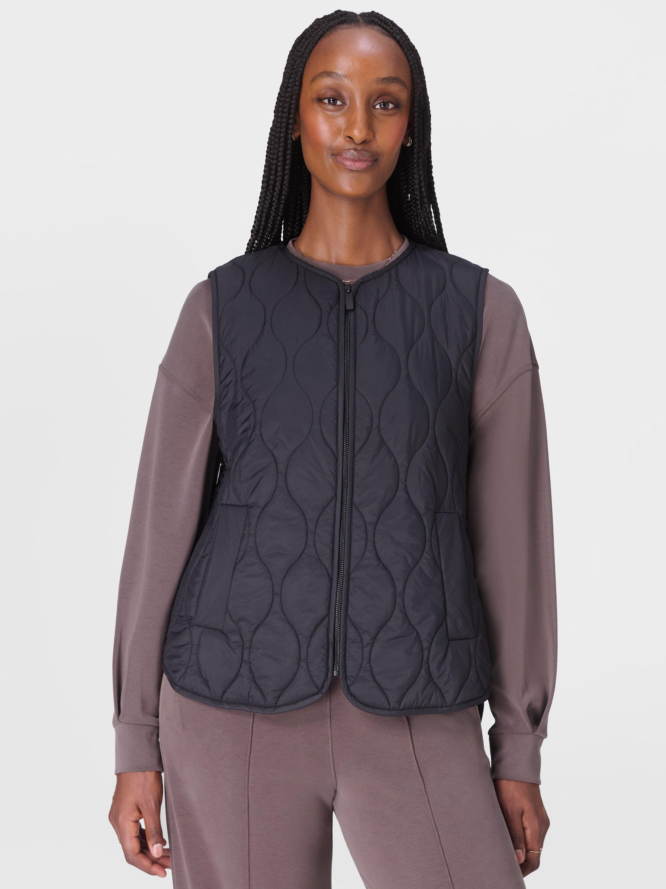 Product image 1 of 8, which shows Sweaty Betty Lightweight Quilted Gilet, Black, XXS