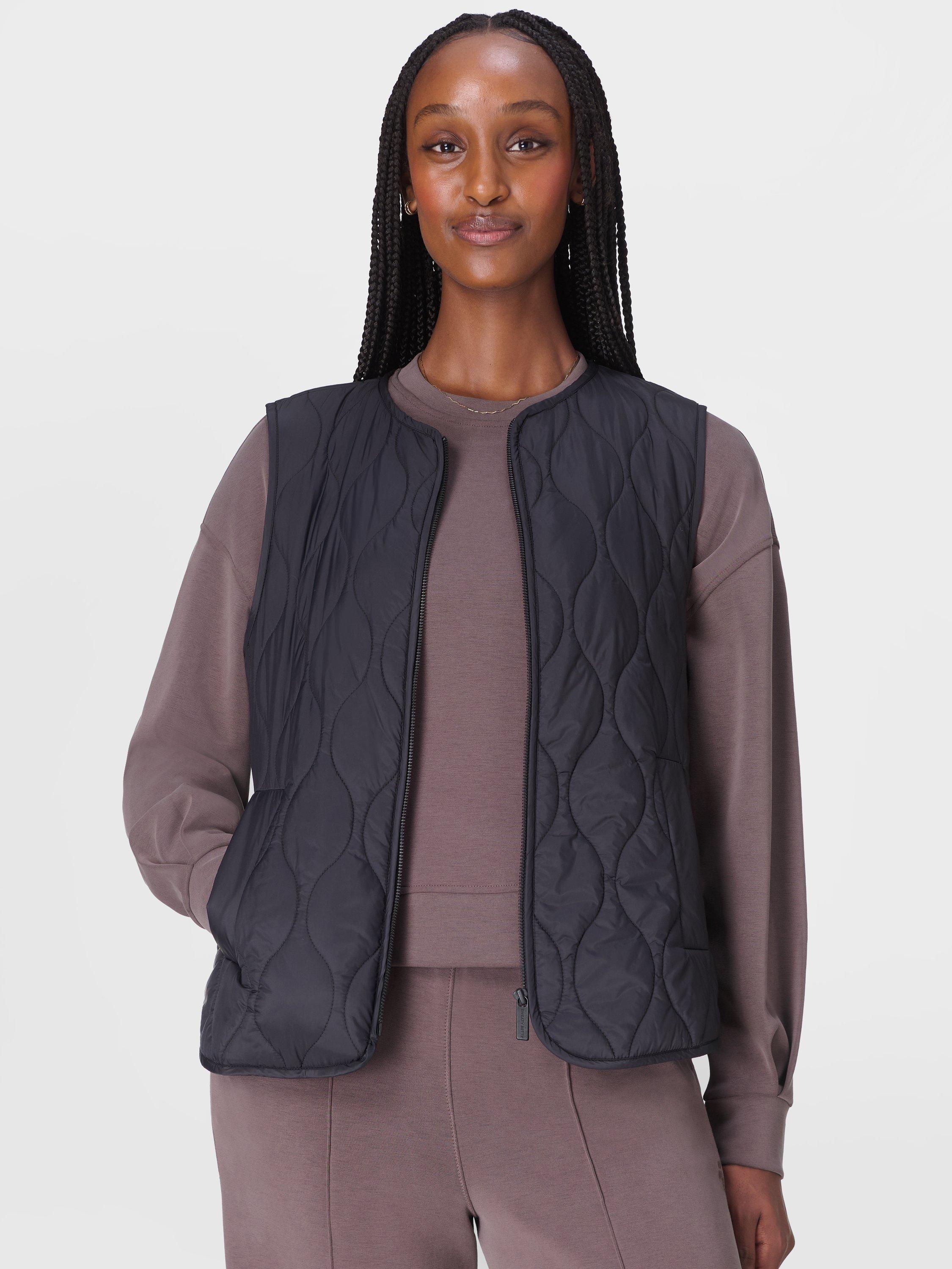 Product image 2 of 8, which shows Sweaty Betty Lightweight Quilted Gilet, Black, XXS
