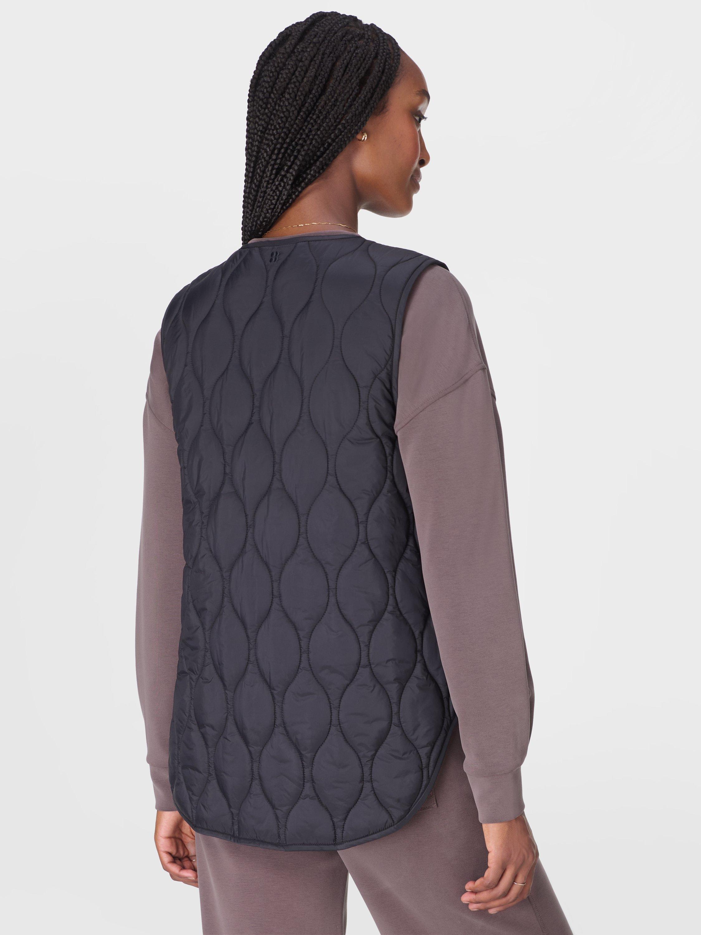 Product image 4 of 8, which shows Sweaty Betty Lightweight Quilted Gilet, Black, XXS
