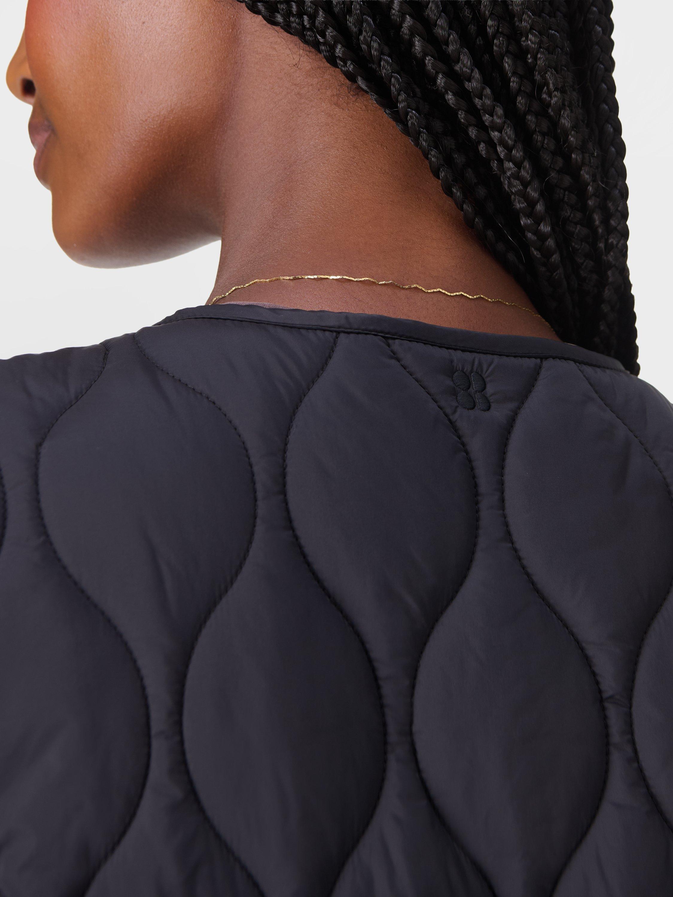Product image 5 of 8, which shows Sweaty Betty Lightweight Quilted Gilet, Black, XXS