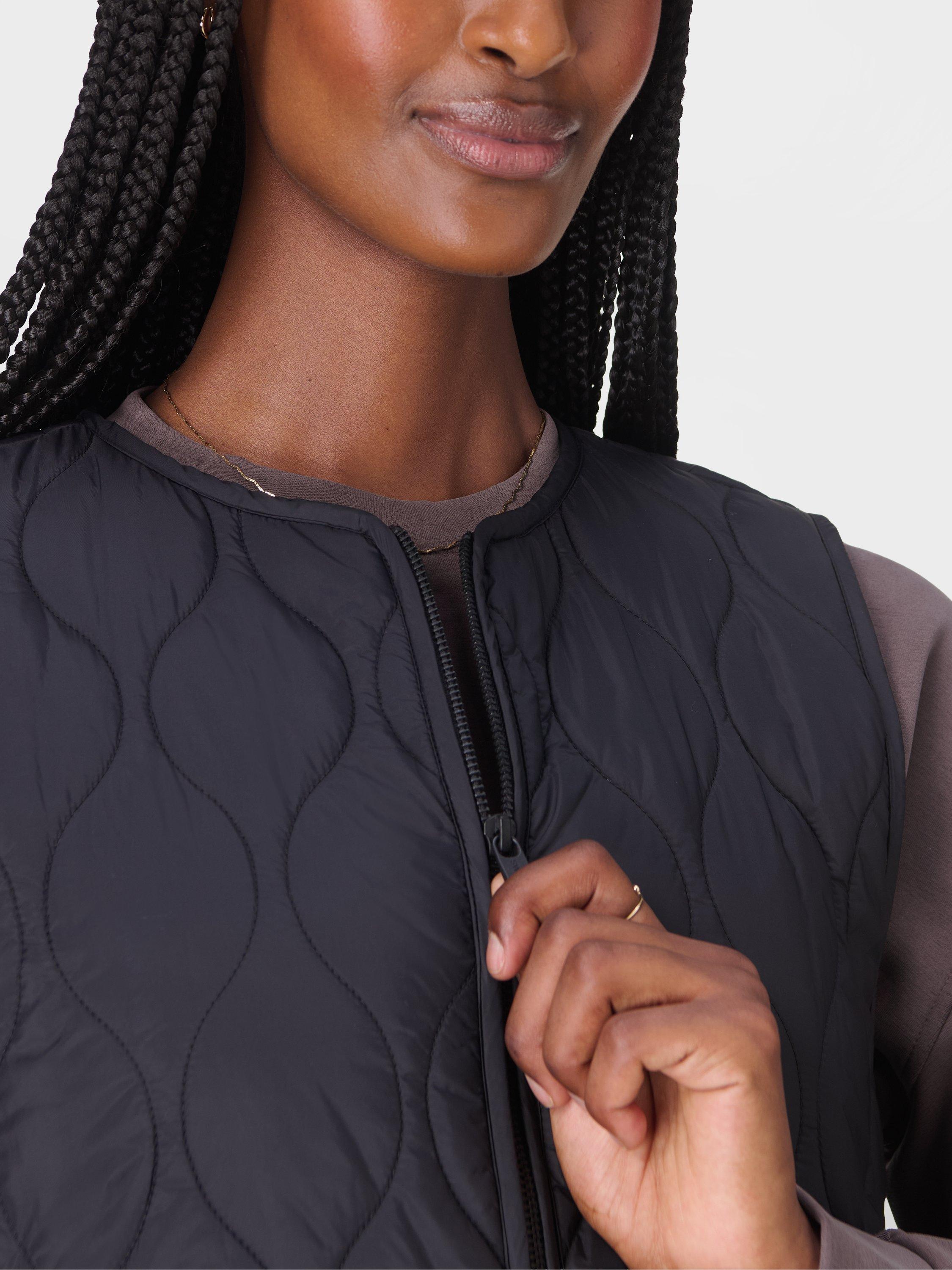 Product image 7 of 8, which shows Sweaty Betty Lightweight Quilted Gilet, Black, XXS