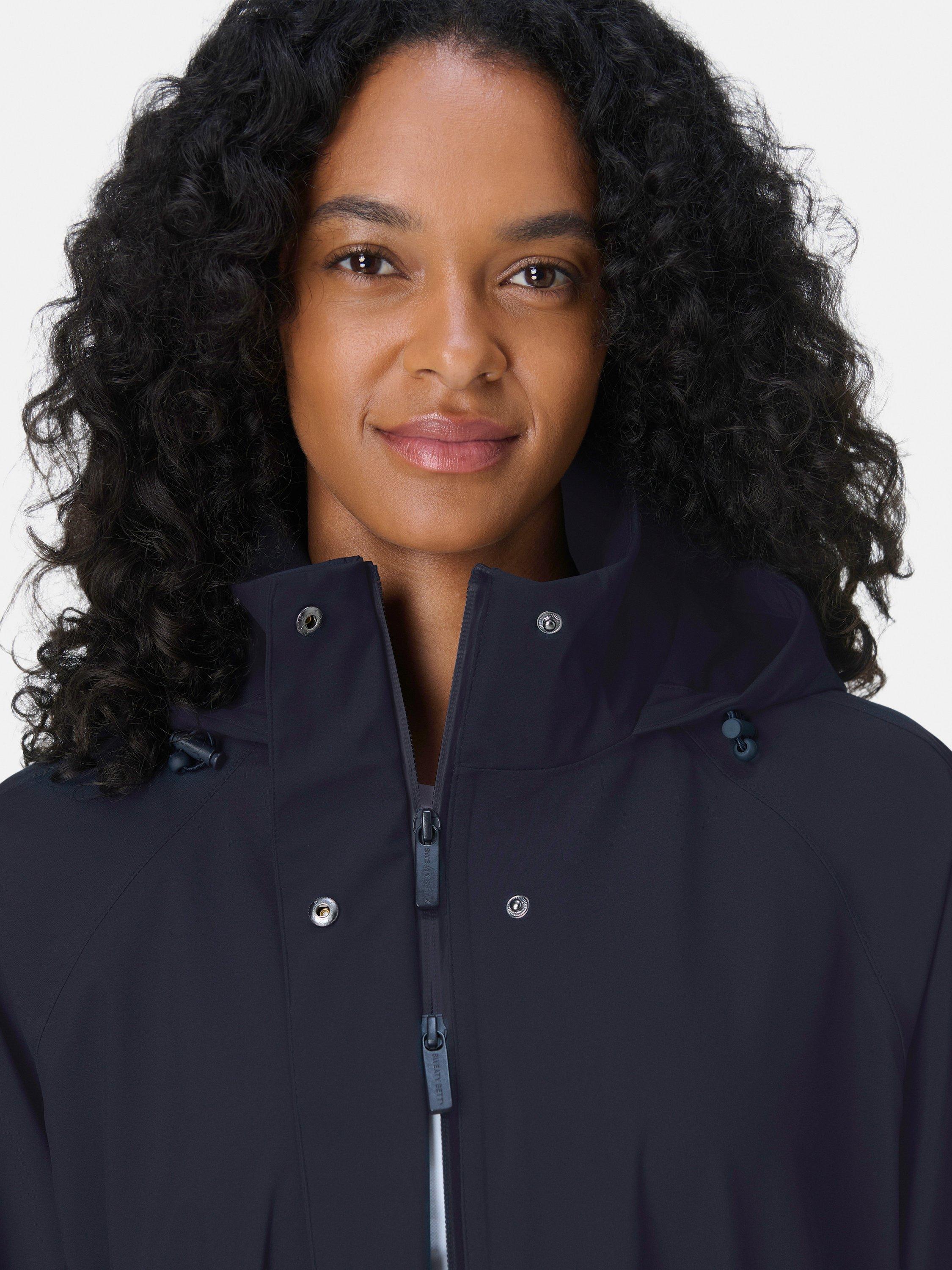 Product image 6 of 7, which shows Sweaty Betty Motion Technical Longline Parka, French Navy Blue, XXS