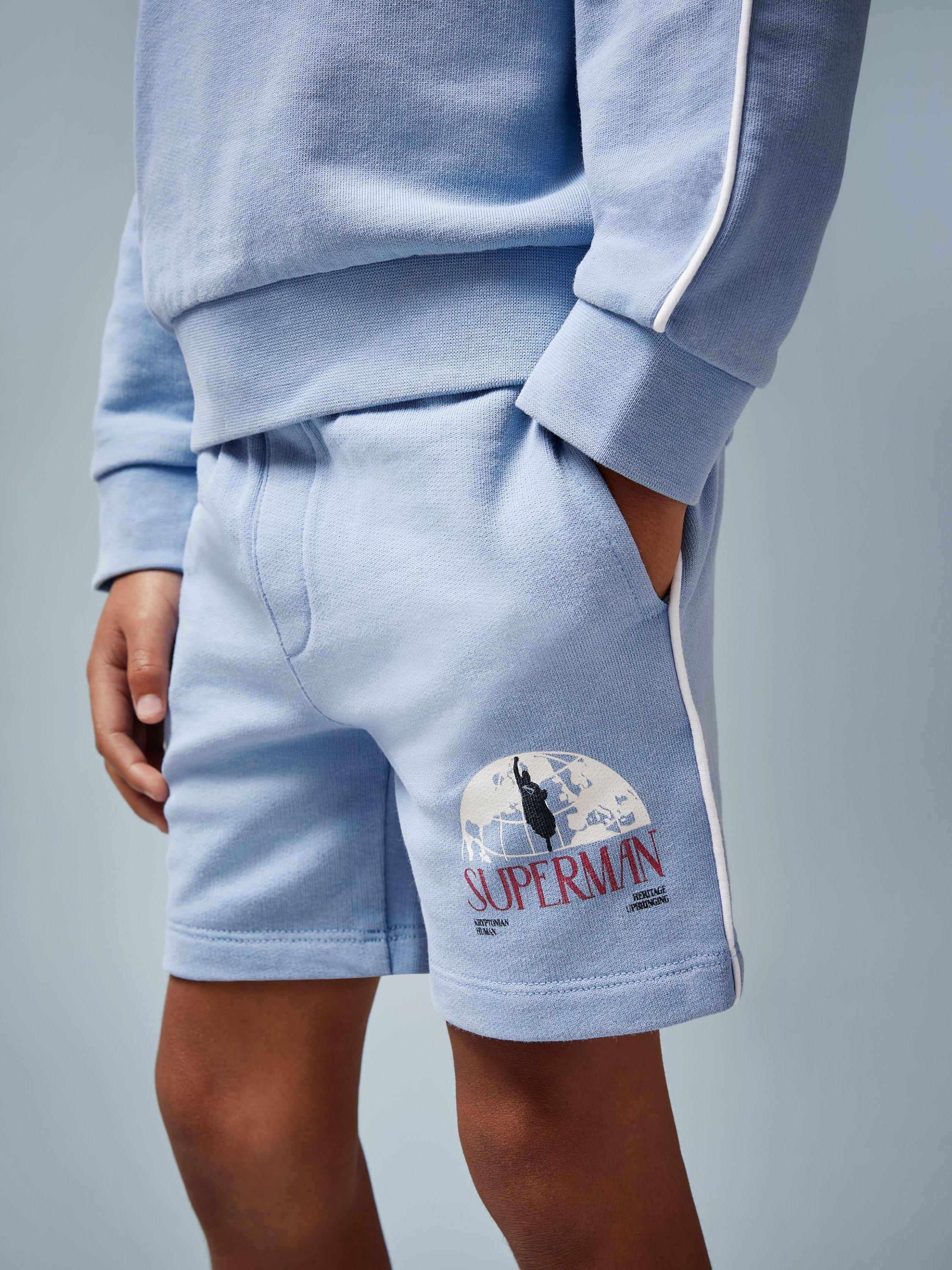 Product image 1 of 5, which shows Reiss Kids' Superman Shorts, Light Blue, 4-5 years