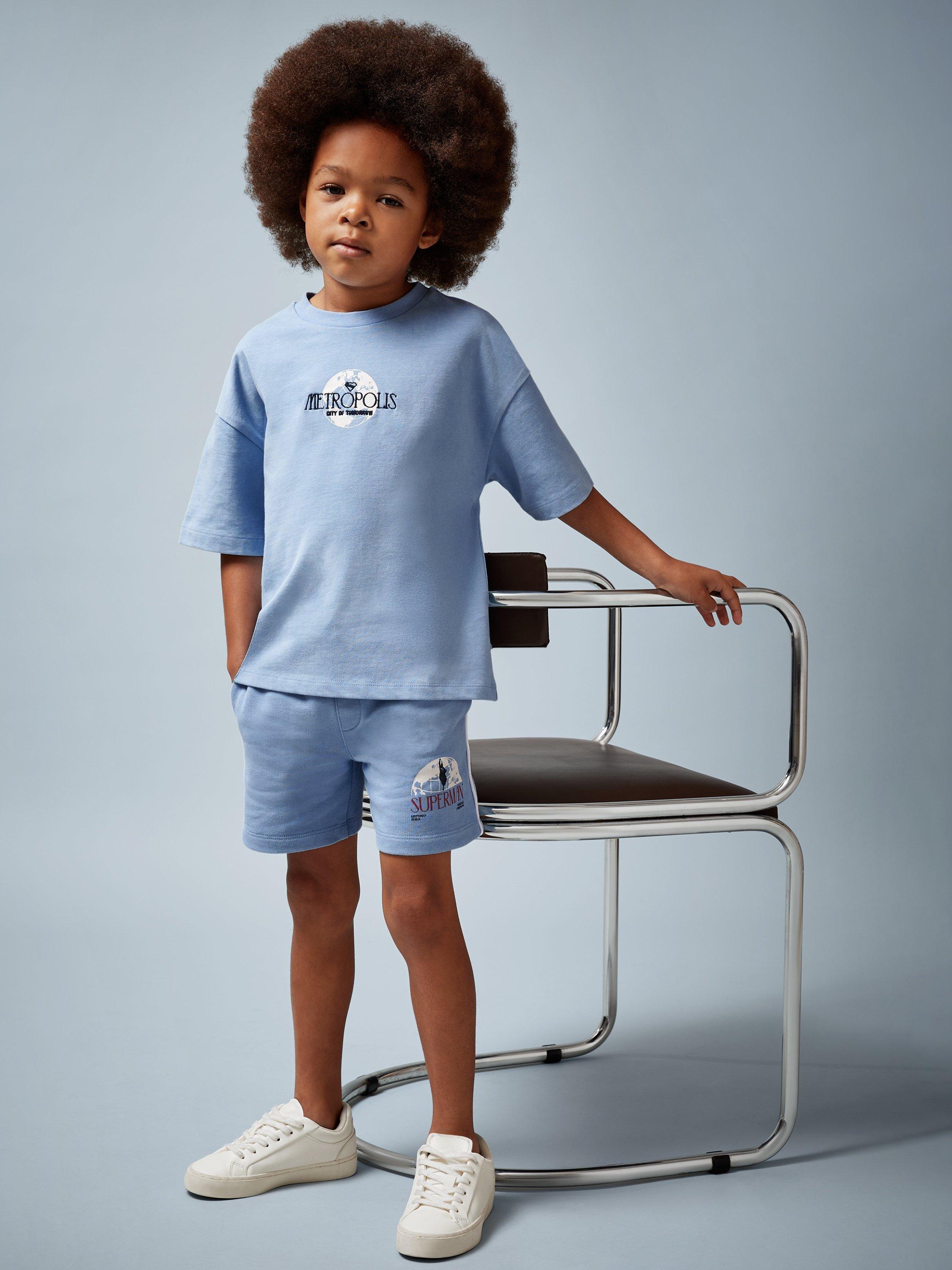 Product image 4 of 5, which shows Reiss Kids' Superman Shorts, Light Blue, 4-5 years