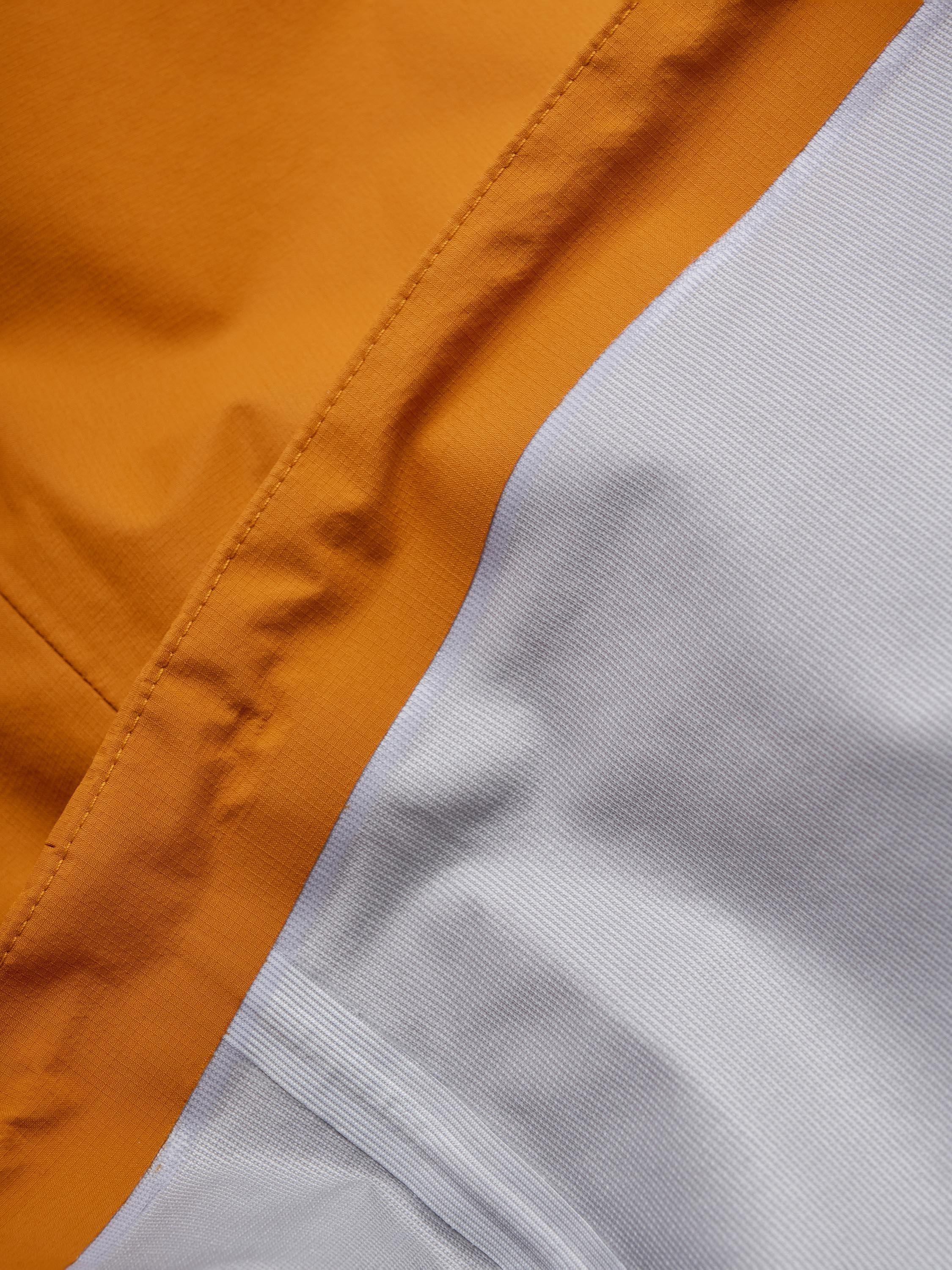 Product image 9 of 11, which shows Montane Men's Cetus Waterproof Jacket, Amber, S