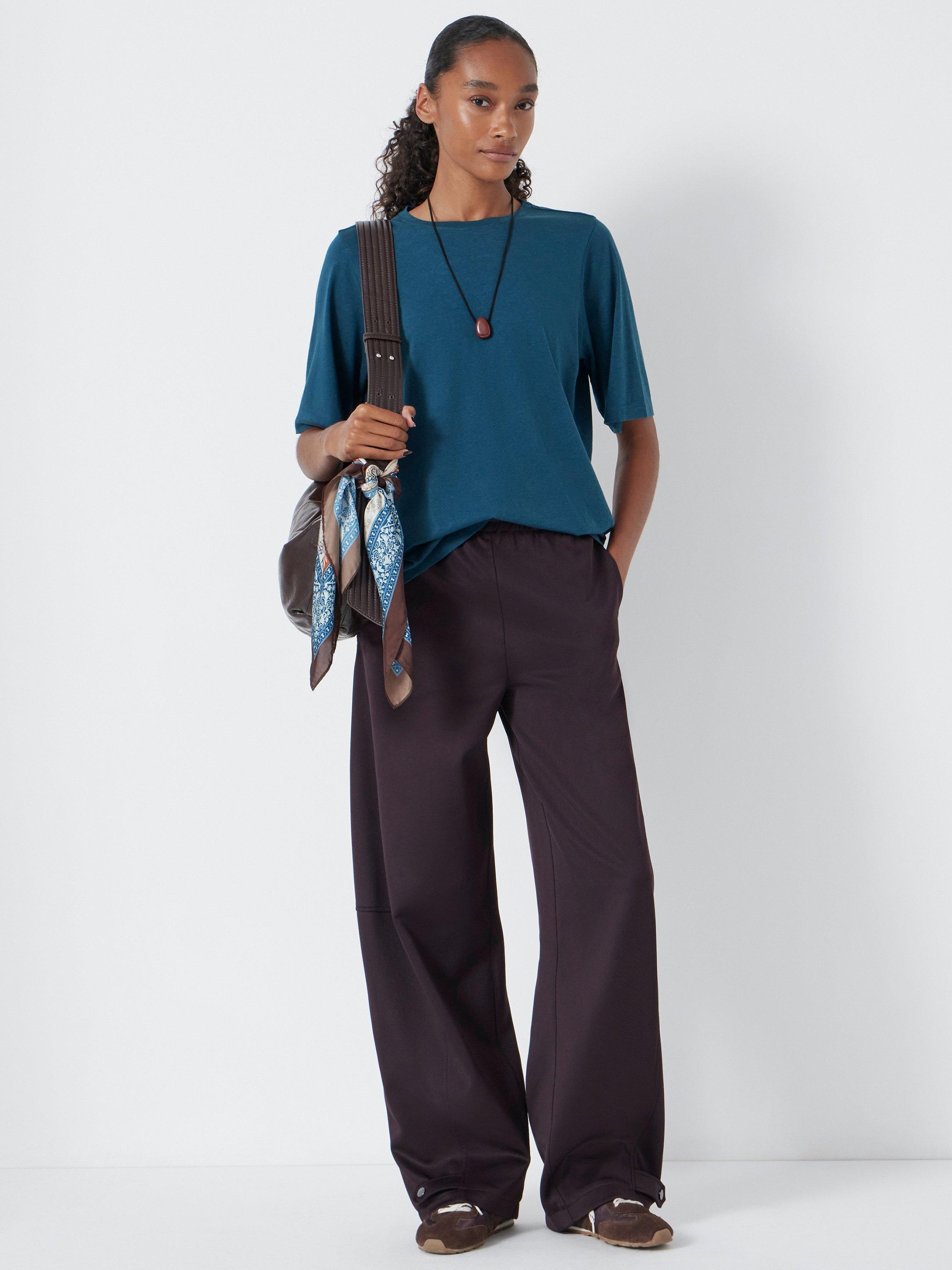 Product image 1 of 4, which shows HUSH Reece Drapey T-shirt, Teal Blue, XXS