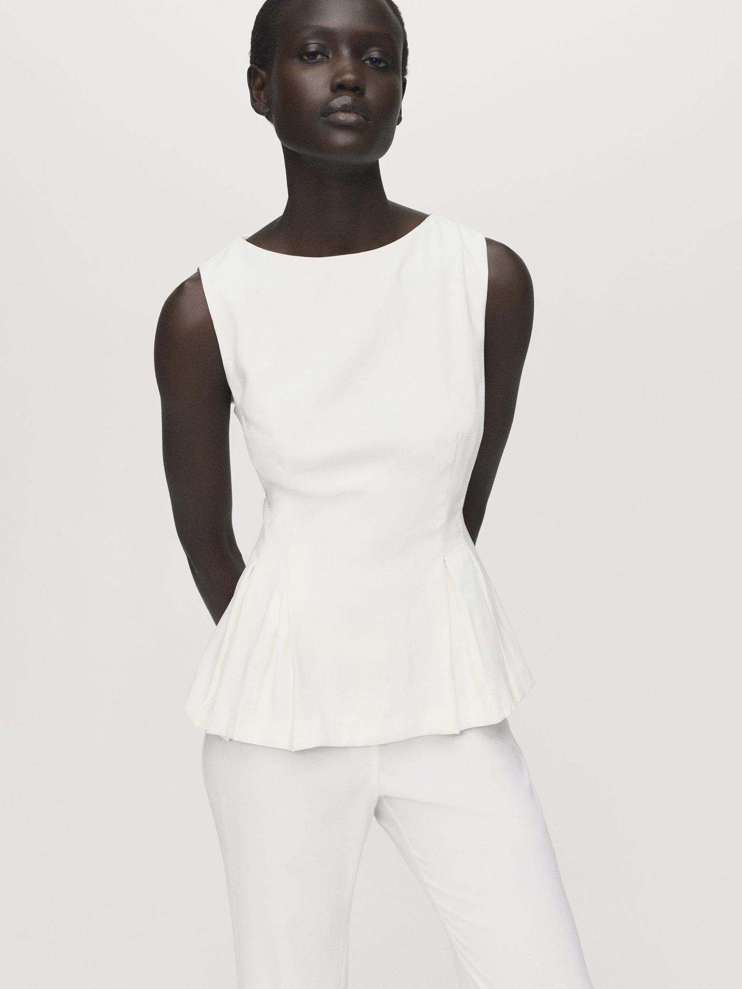 Product image 1 of 8, which shows Mango Naia Pleated Peplum Top, White, L