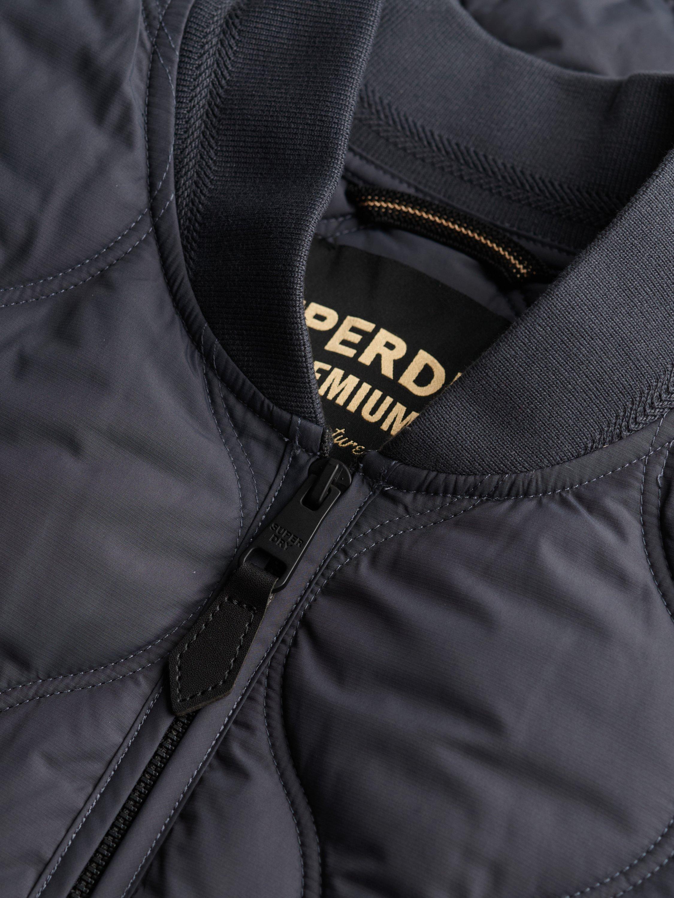 Product image 6 of 6, which shows Superdry Short Quilted Liner Jacket, Ebony, 10