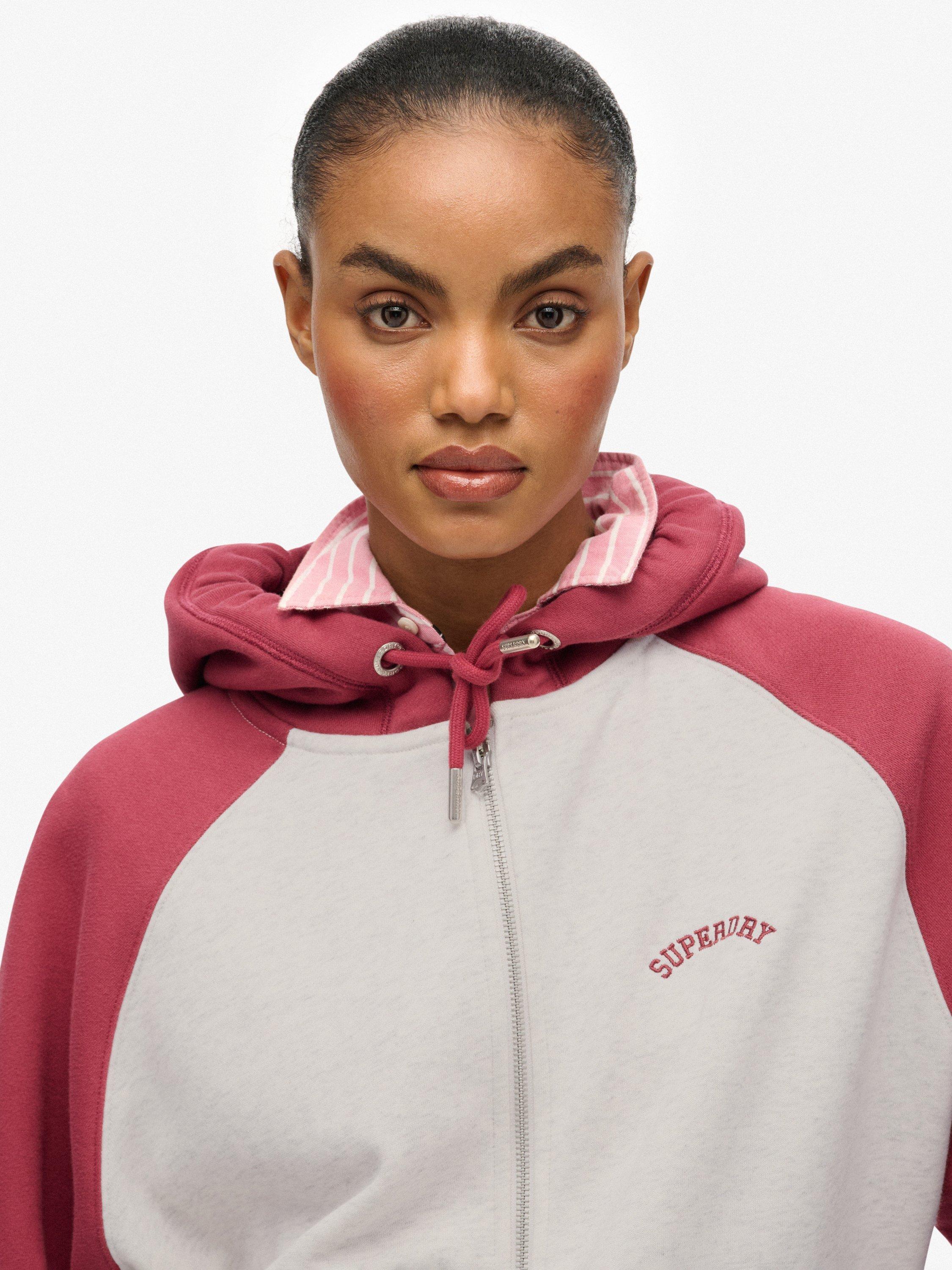 Product image 5 of 6, which shows Superdry Essential Logo Raglan Zip Hoodie, White/Bordeaux Red, 14