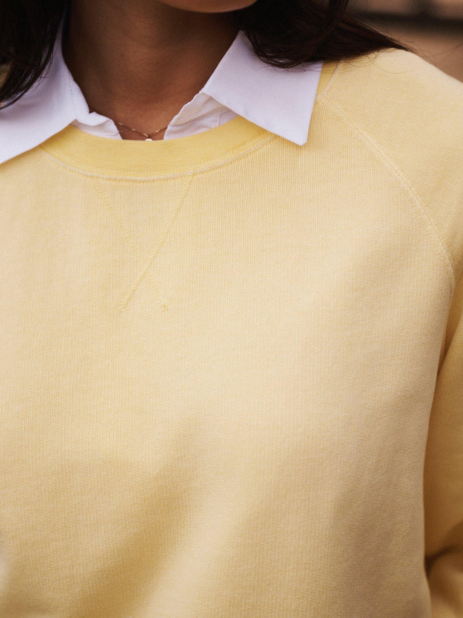 Product image 4 of 8, which shows NRBY Sandi Garment Dyed Sweatshirt, Pale Banana, XS