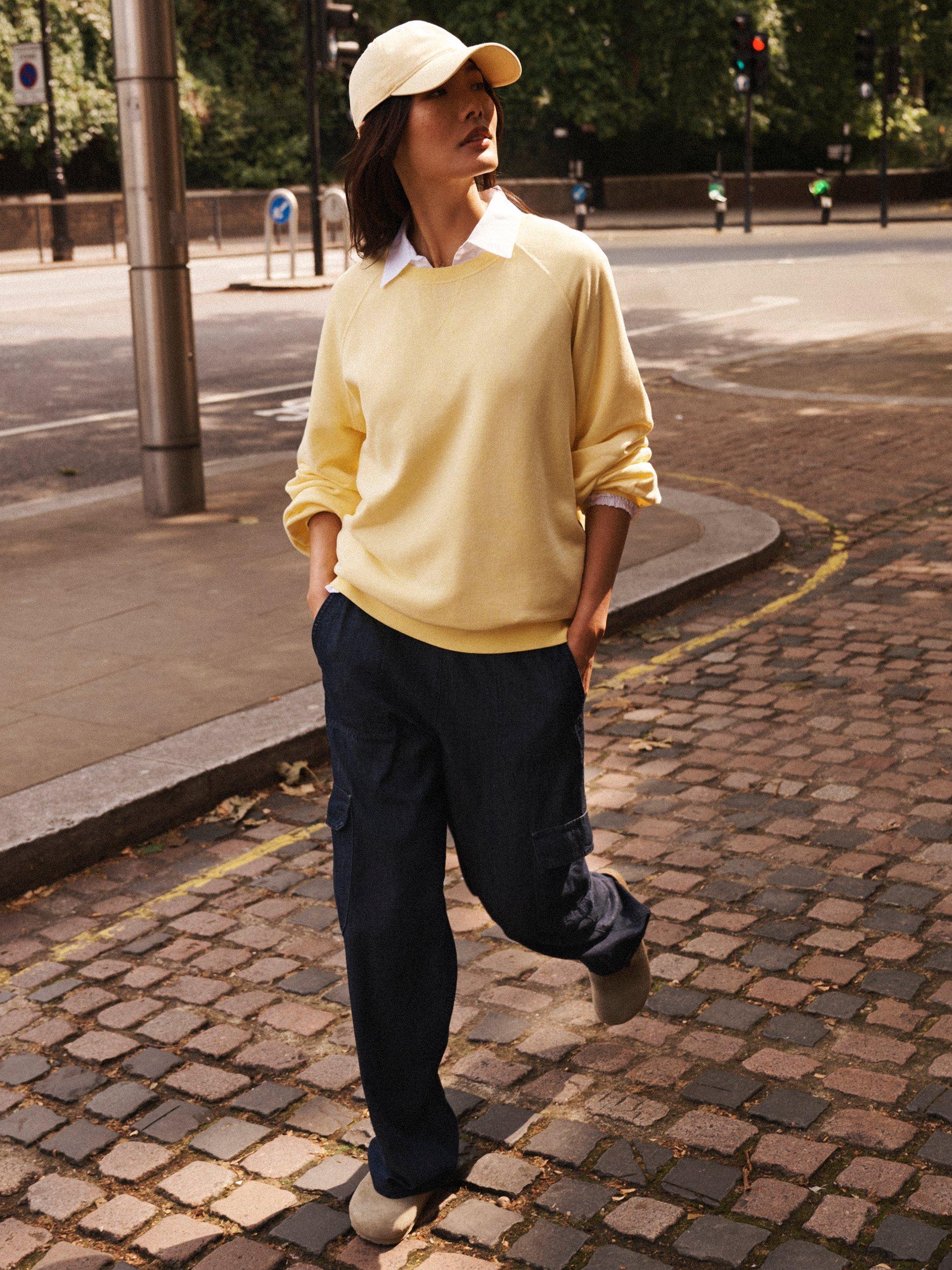Product image 5 of 8, which shows NRBY Sandi Garment Dyed Sweatshirt, Pale Banana, XS