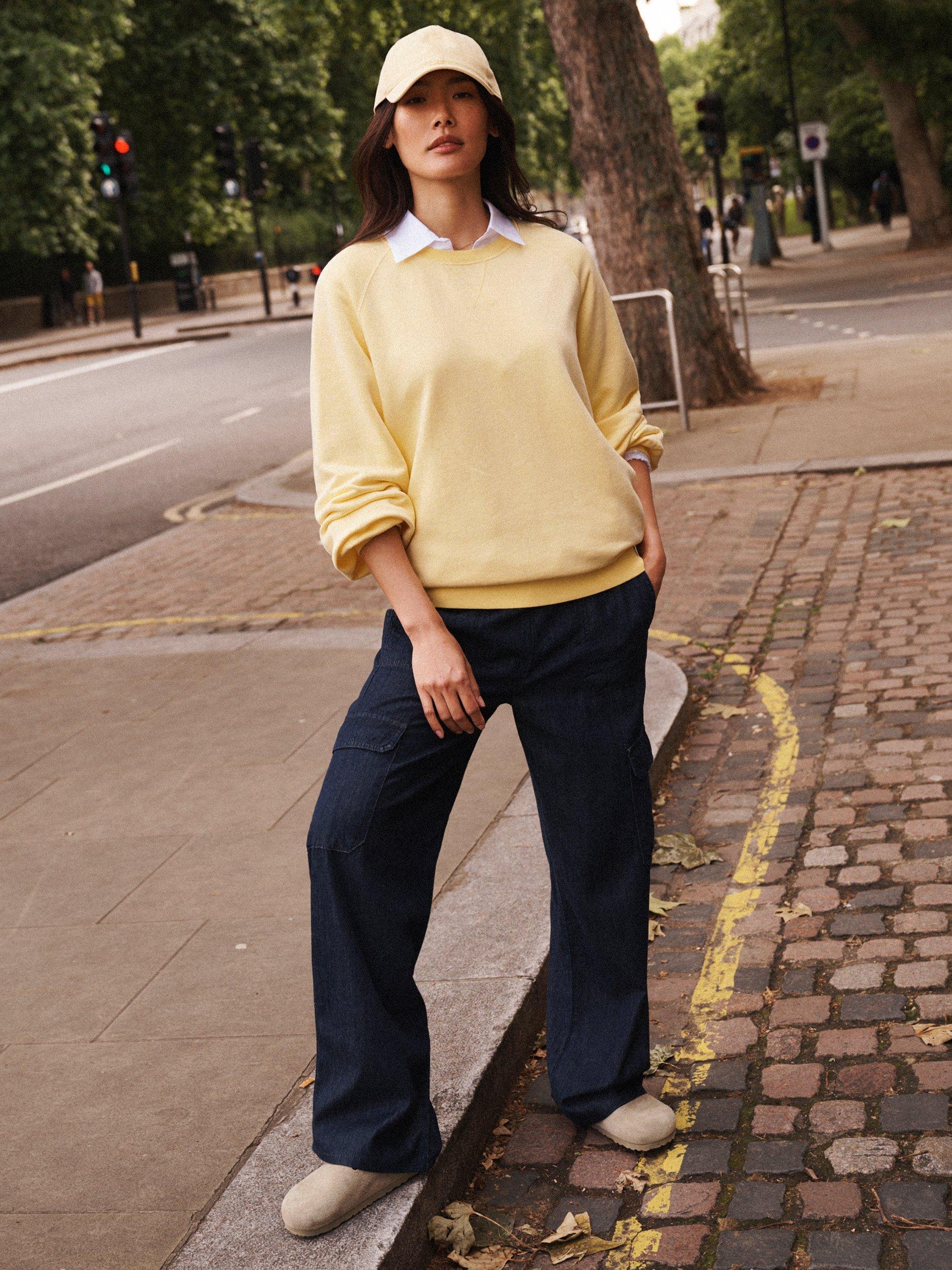 Product image 6 of 8, which shows NRBY Sandi Garment Dyed Sweatshirt, Pale Banana, XS