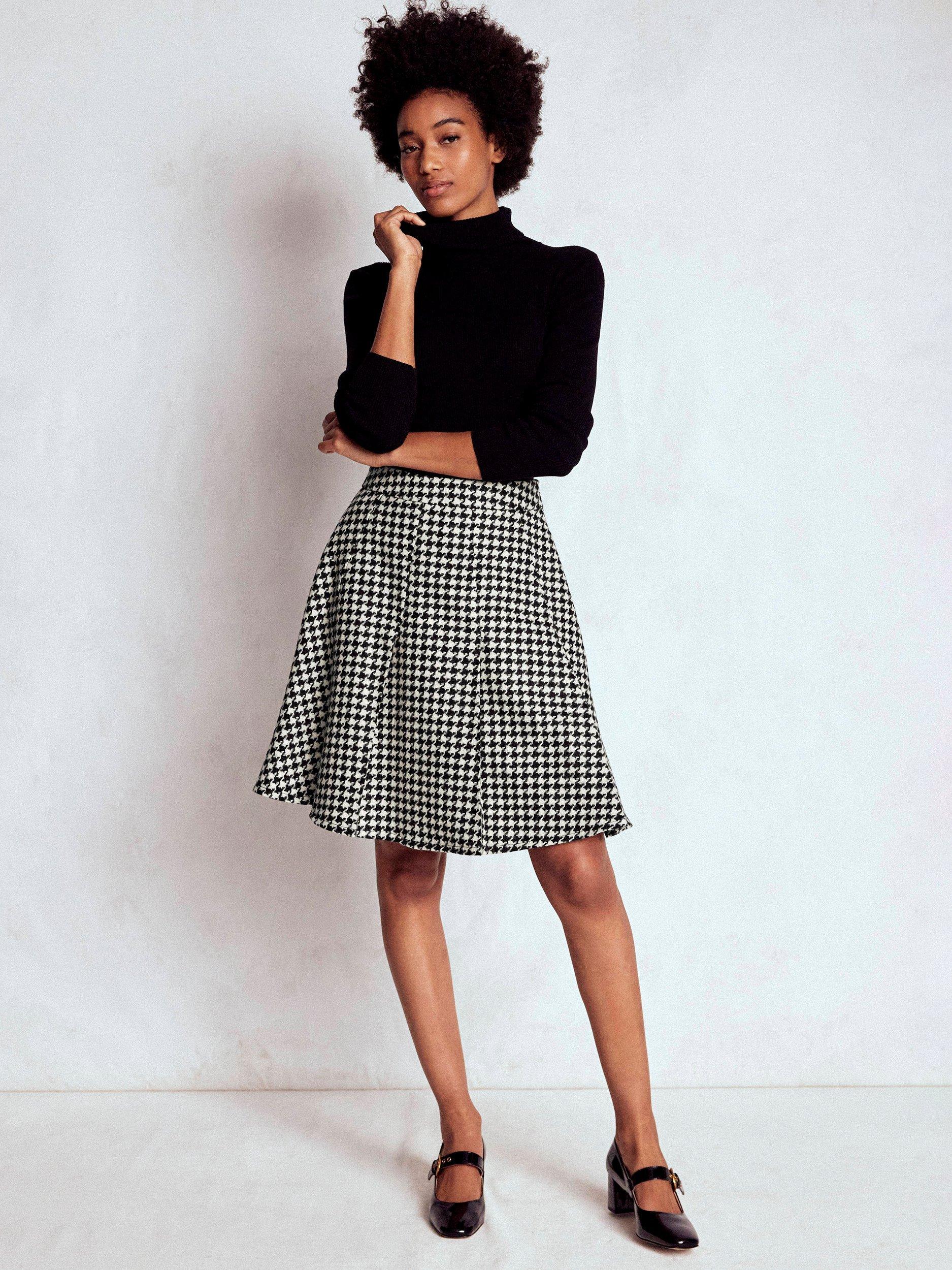 Product image 1 of 5, which shows Boden Houndstooth Pure Wool Flippy Skirt, Black/Multi, 8