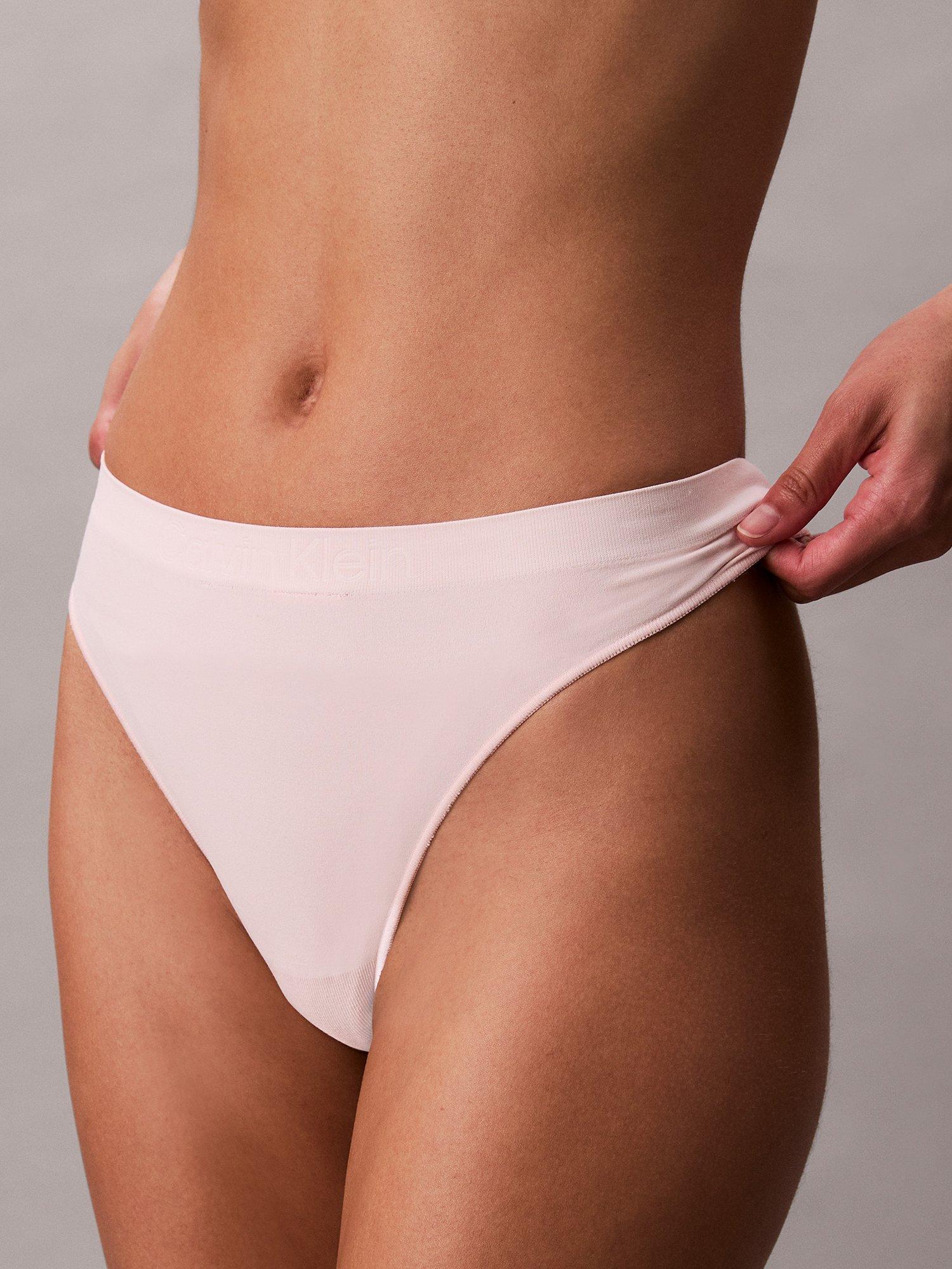 Product image 5 of 6, which shows Calvin Klein Bonded Flex Seamless Thong, Eggshell Pink, XS