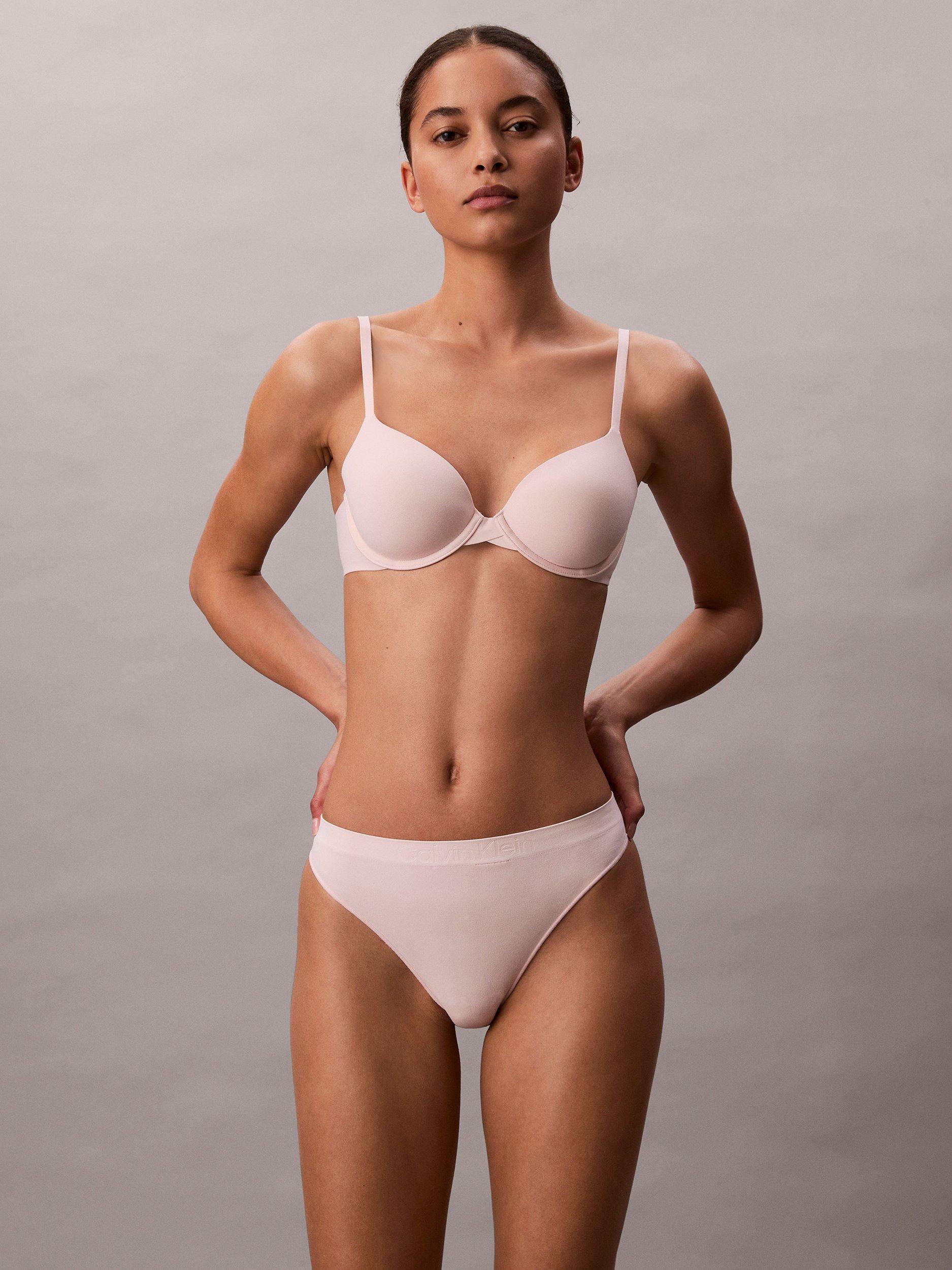 Product image 6 of 6, which shows Calvin Klein Bonded Flex Seamless Thong, Eggshell Pink, XS