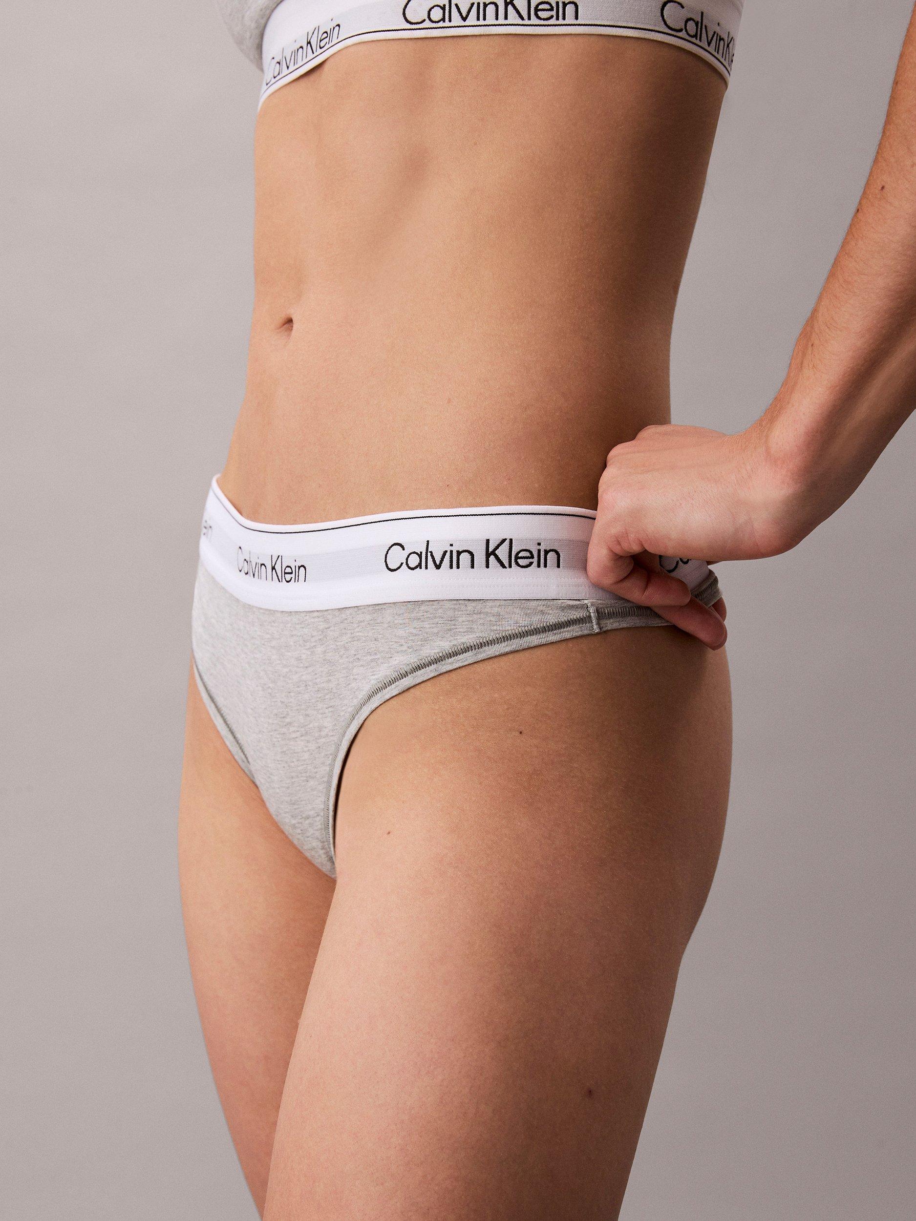 Product image 4 of 7, which shows Calvin Klein Icon Cotton Modal Thong, Grey Heather, XS