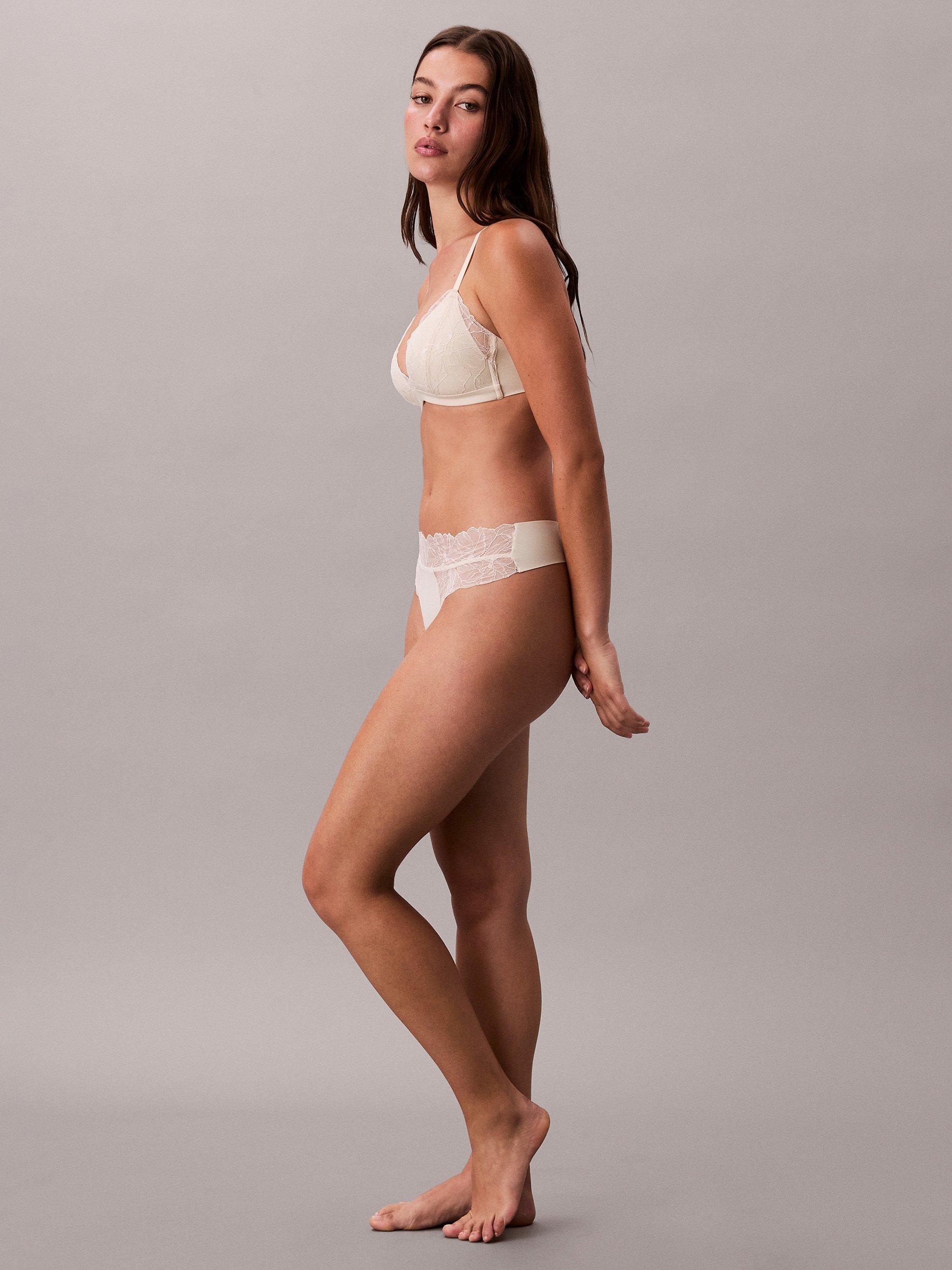 Product image 6 of 6, which shows Calvin Klein Perfectly Fit Lace Thong, Bone White, XS