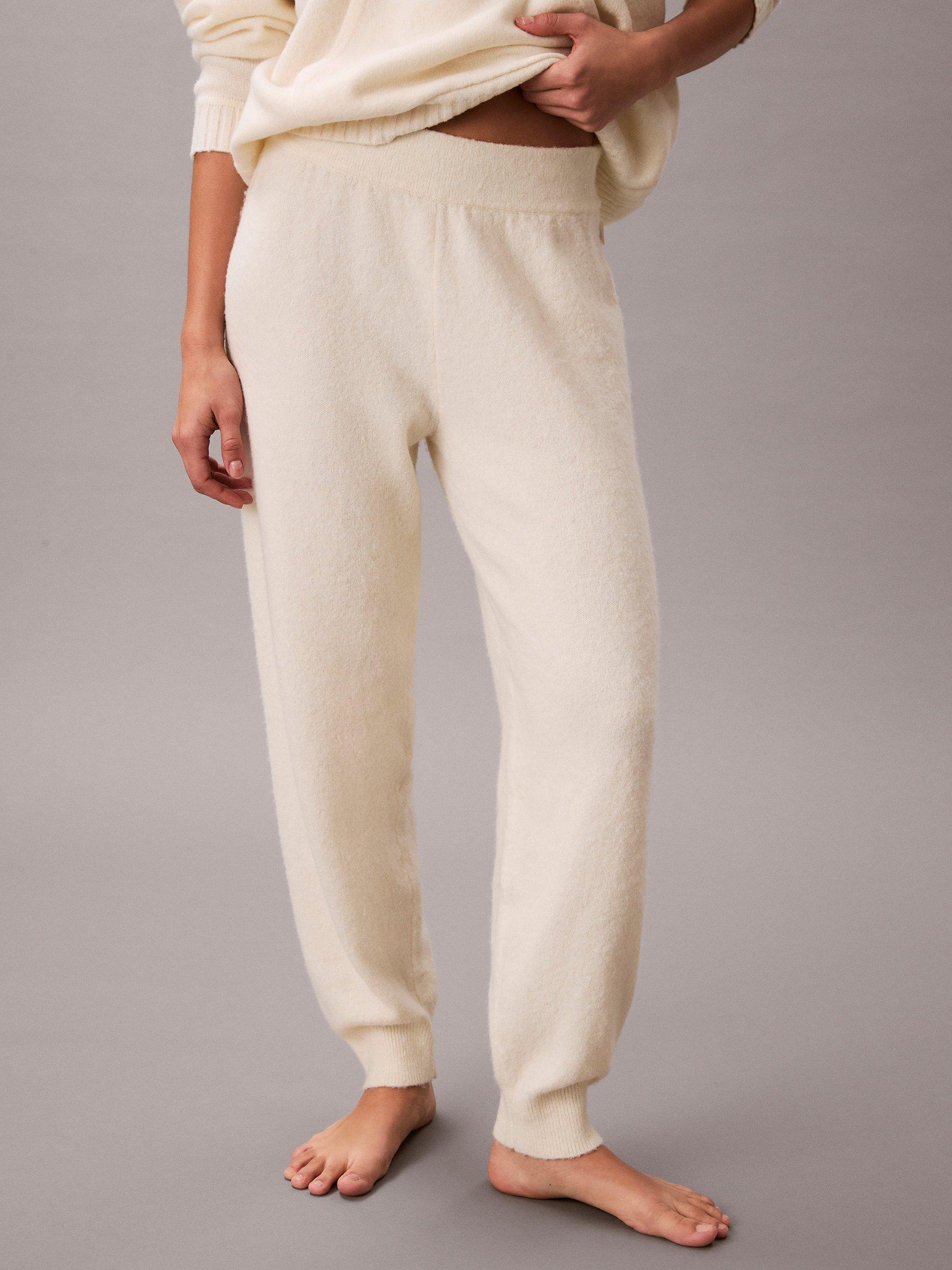 Product image 1 of 6, which shows Calvin Klein Plush Terry Lounge Joggers, Ivory, M