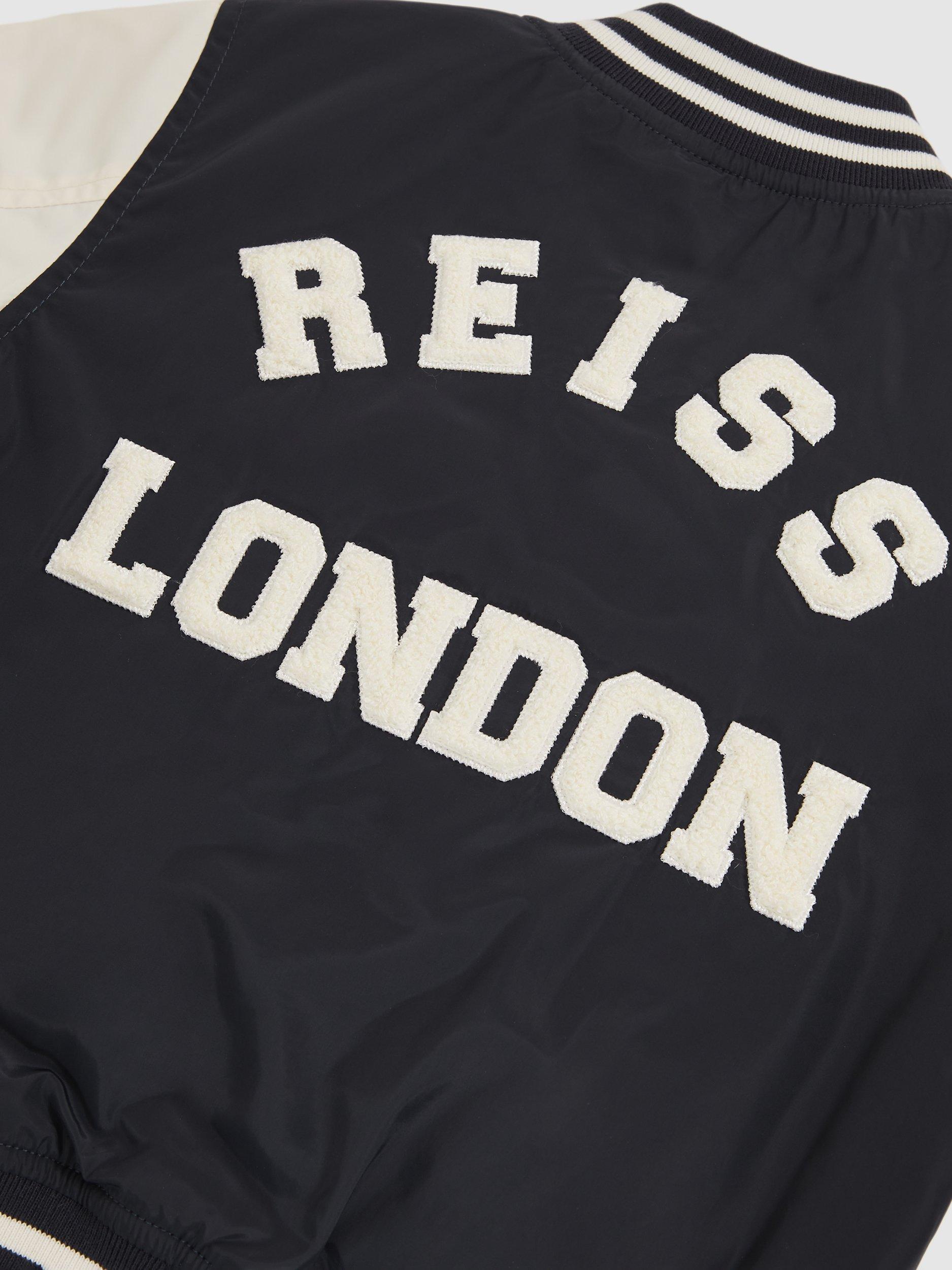 Product image 4 of 4, which shows Reiss Kids' Arkan Mink Bomber Jacket, Navy/Off White, 10-11 years