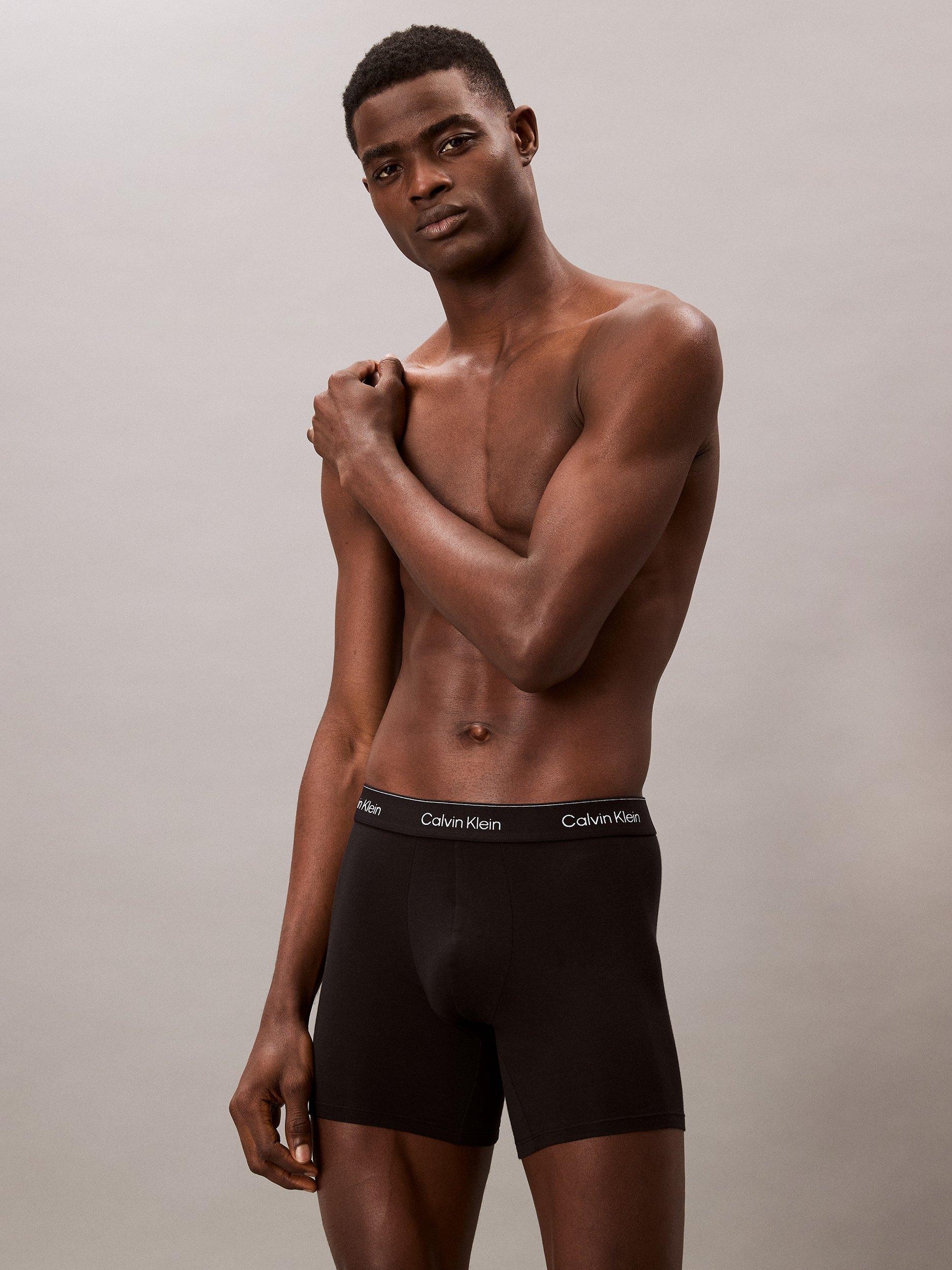 Product image 2 of 6, which shows Calvin Klein Icon Stretch Cotton Trunks, Pack of 5, Black/Multi, S