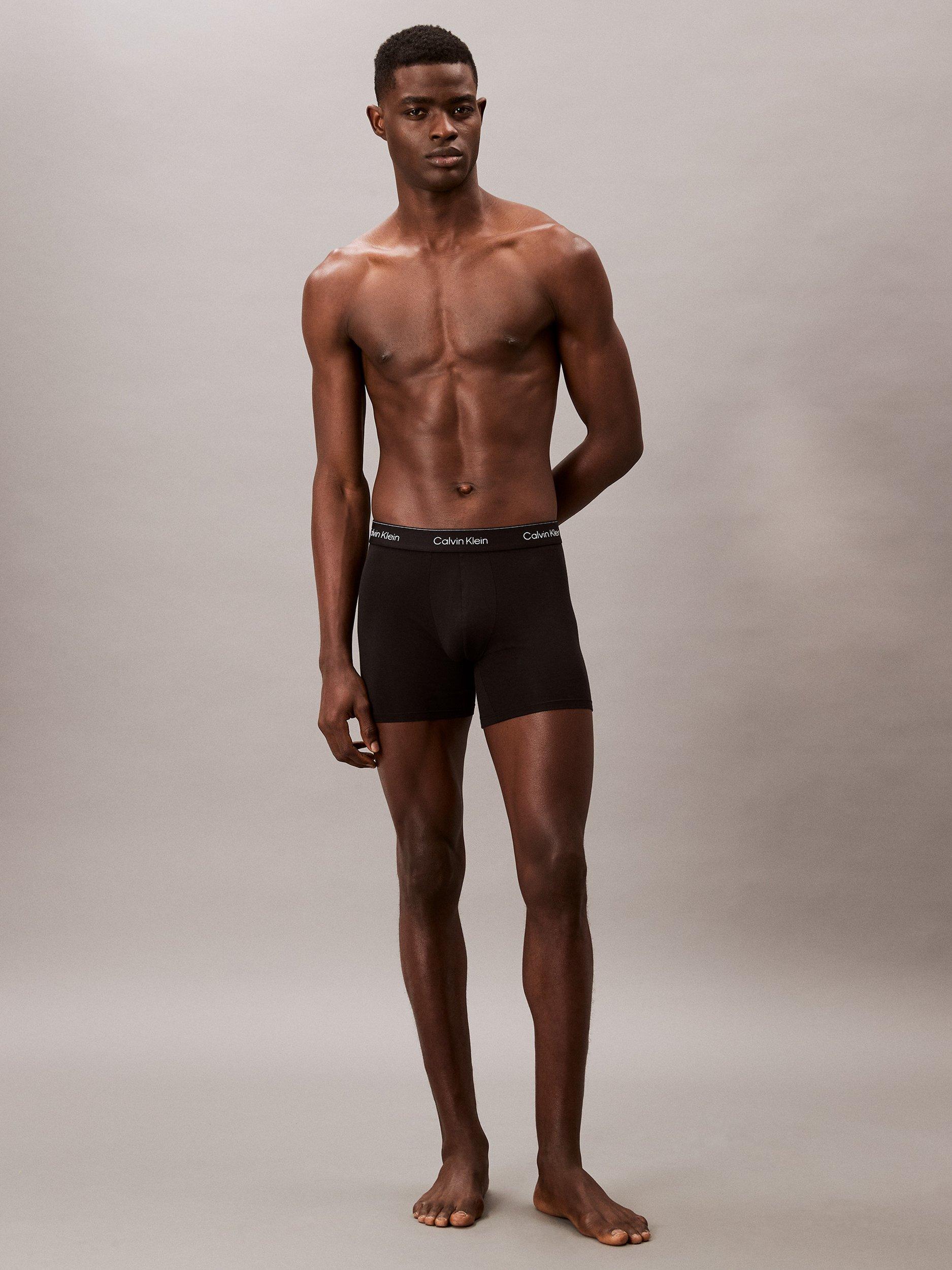 Product image 4 of 6, which shows Calvin Klein Icon Stretch Cotton Trunks, Pack of 5, Black/Multi, S