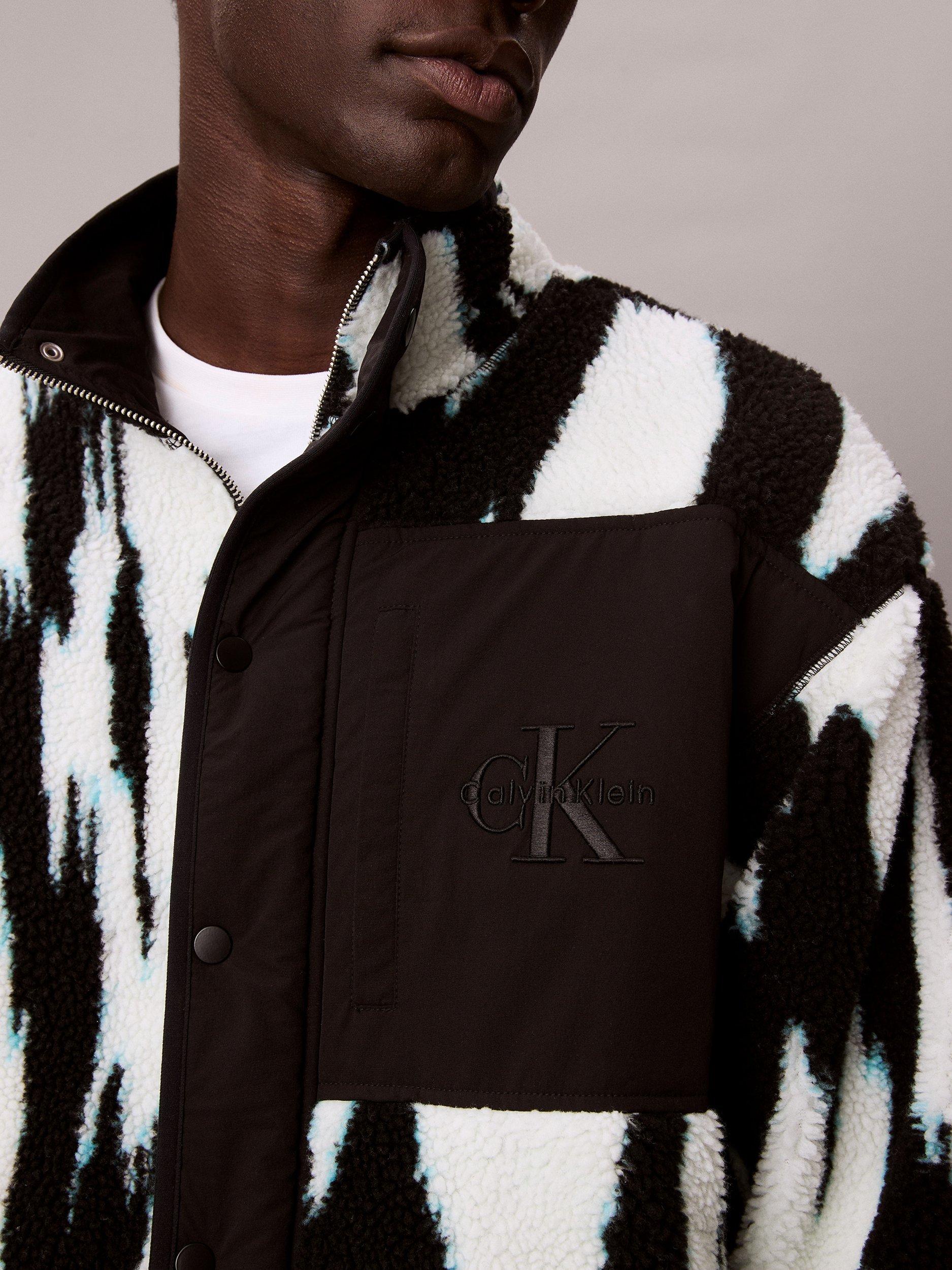 Product image 4 of 6, which shows Calvin Klein High Neck Printed Sherpa Jacket, Black, XS