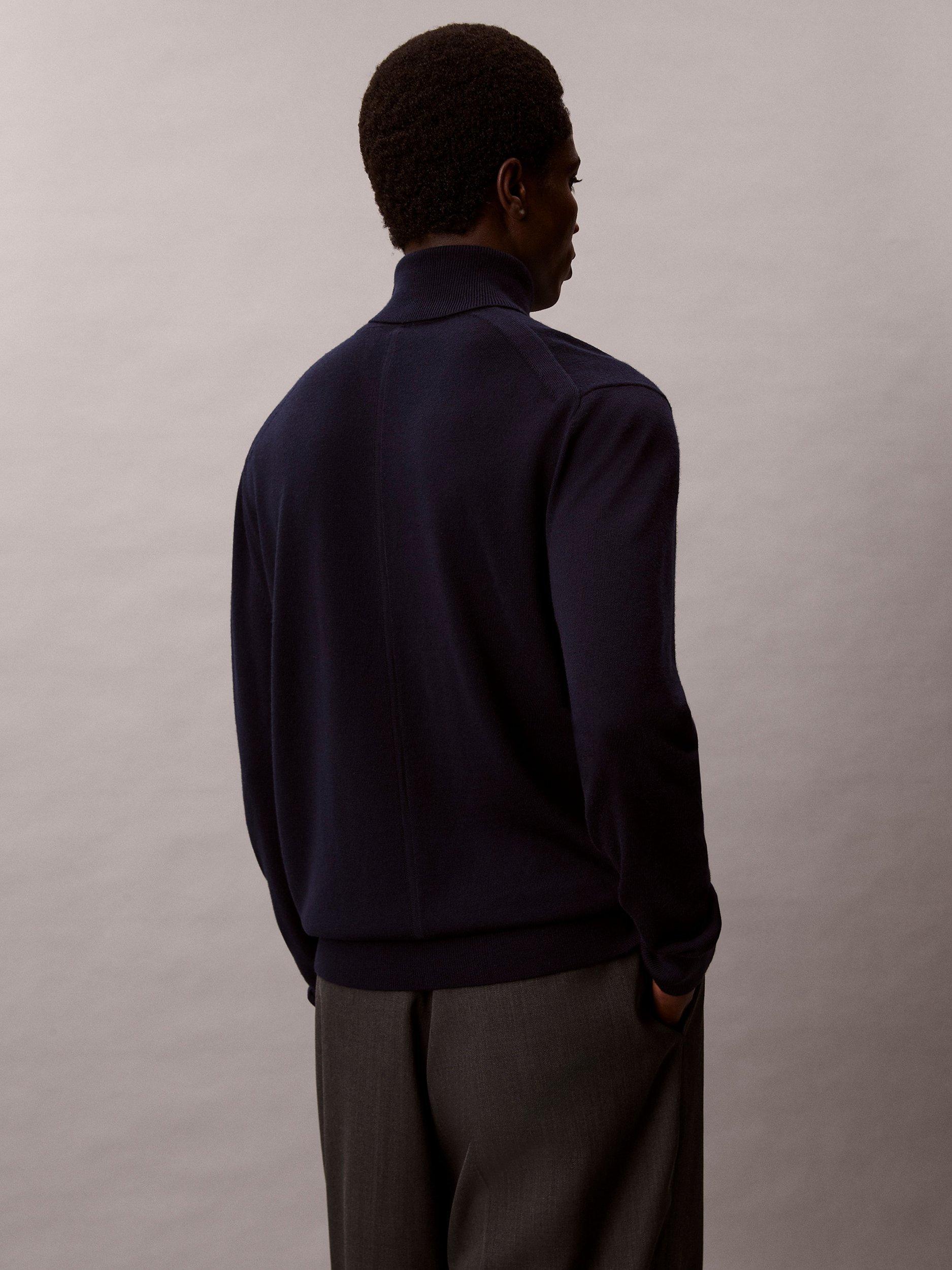 Product image 2 of 6, which shows Calvin Klein Turtle Neck Merino Wool Sweater, Dark Sapphire, S