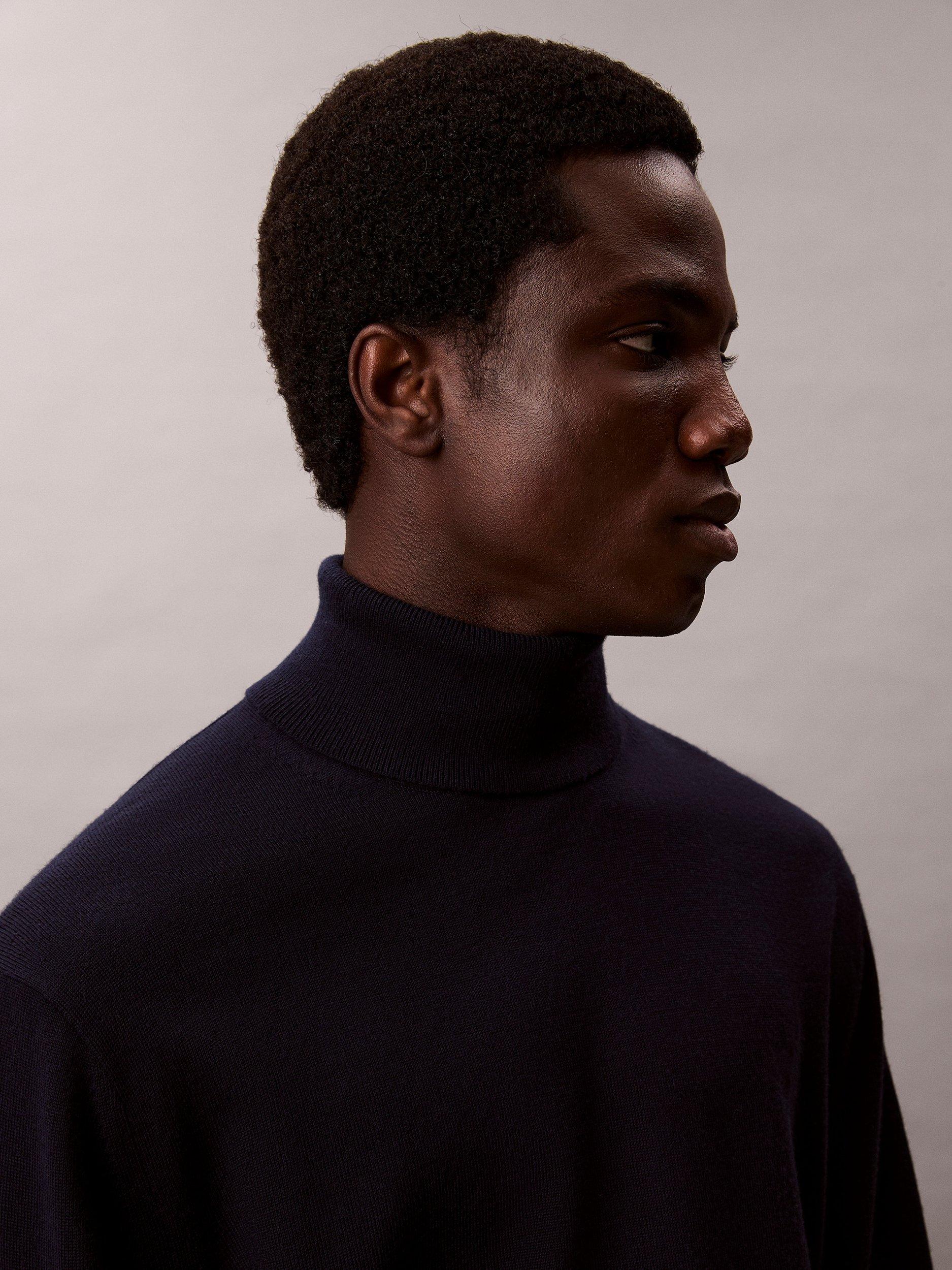 Product image 3 of 6, which shows Calvin Klein Turtle Neck Merino Wool Sweater, Dark Sapphire, S