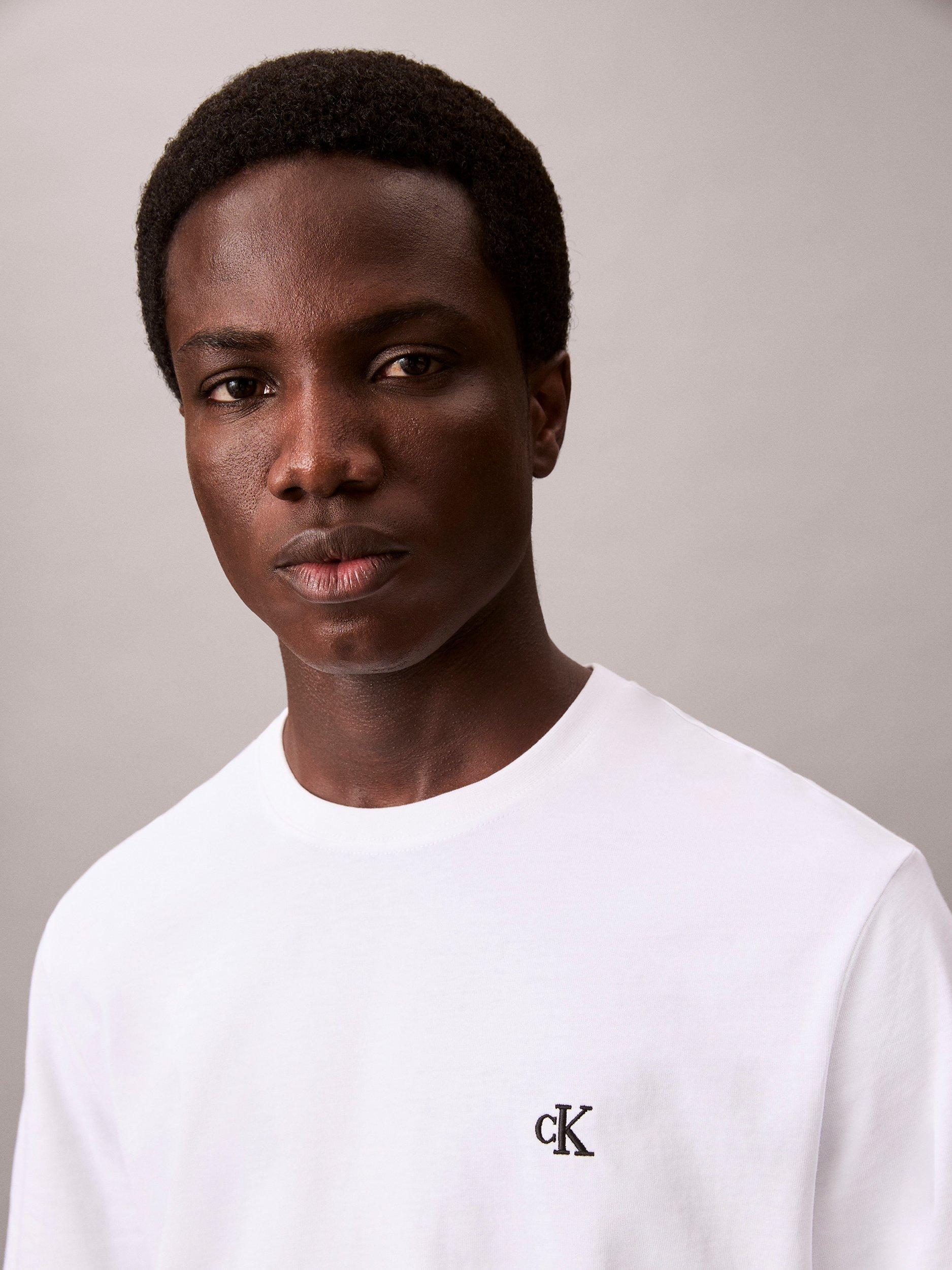 Product image 4 of 6, which shows Calvin Klein Cotton Easy Regular Fit Monogram T-Shirt, Bright White, XS