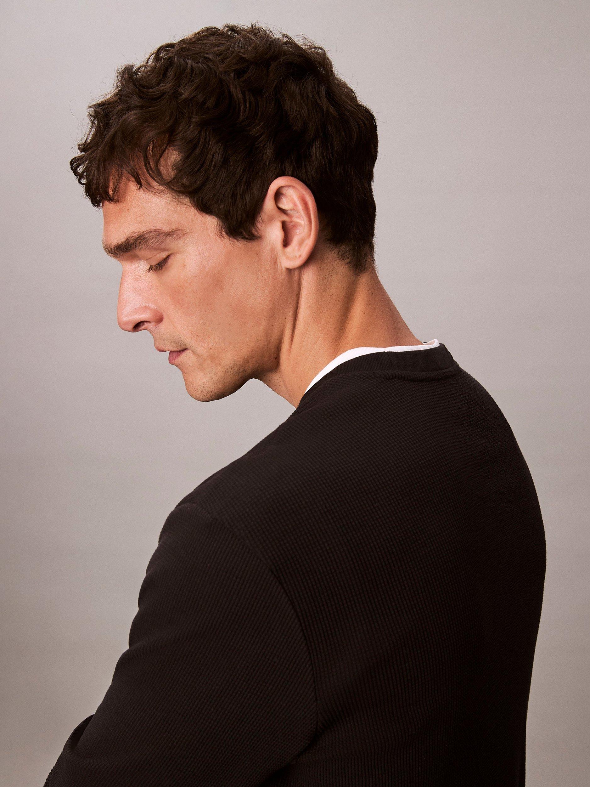 Product image 3 of 7, which shows Calvin Klein Badge Logo Crew Neck Top, Black, XS