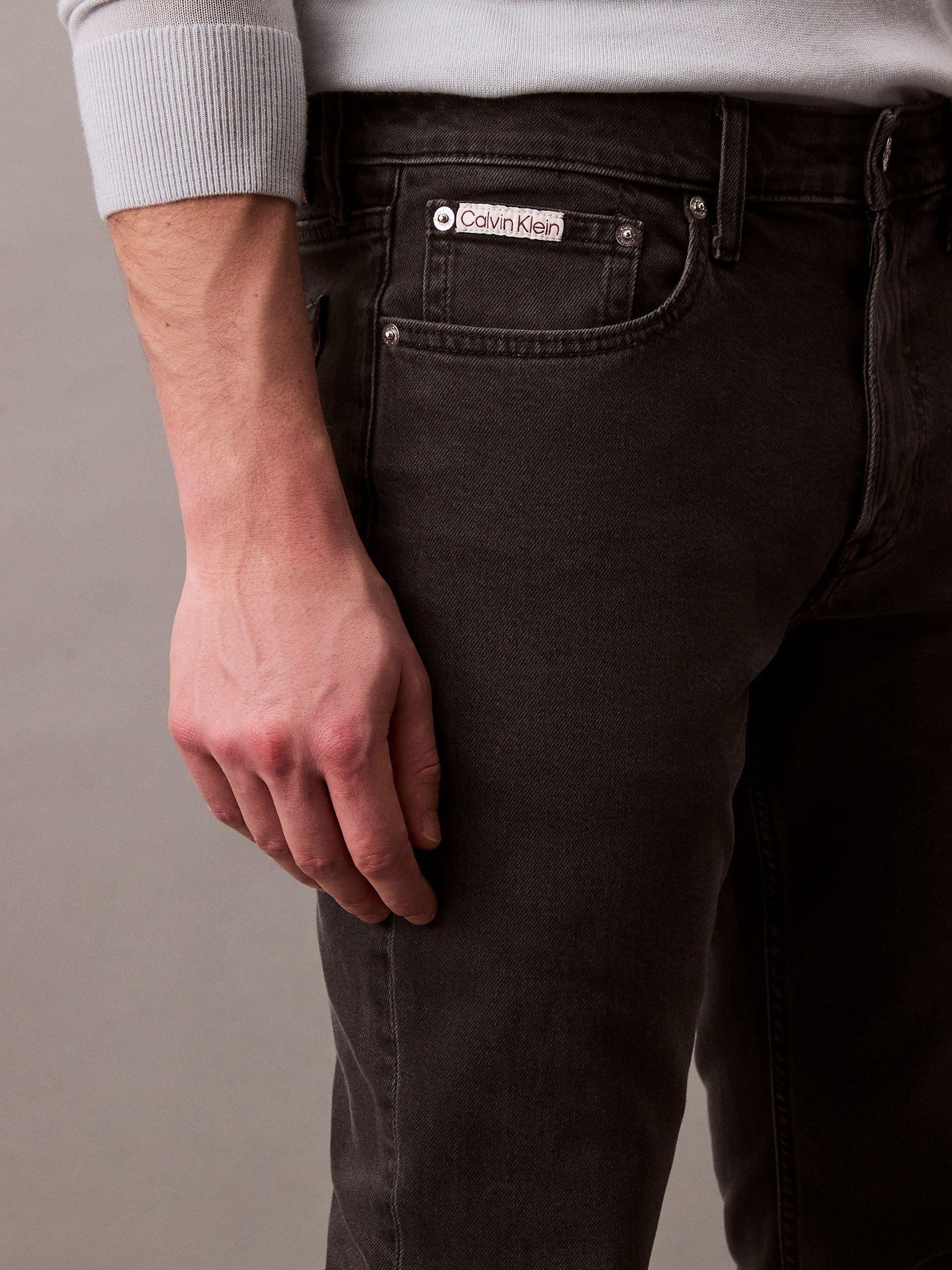 Product image 6 of 7, which shows Calvin Klein Slim Fit Mid Rise Jeans, Ck Essential Black, 28S