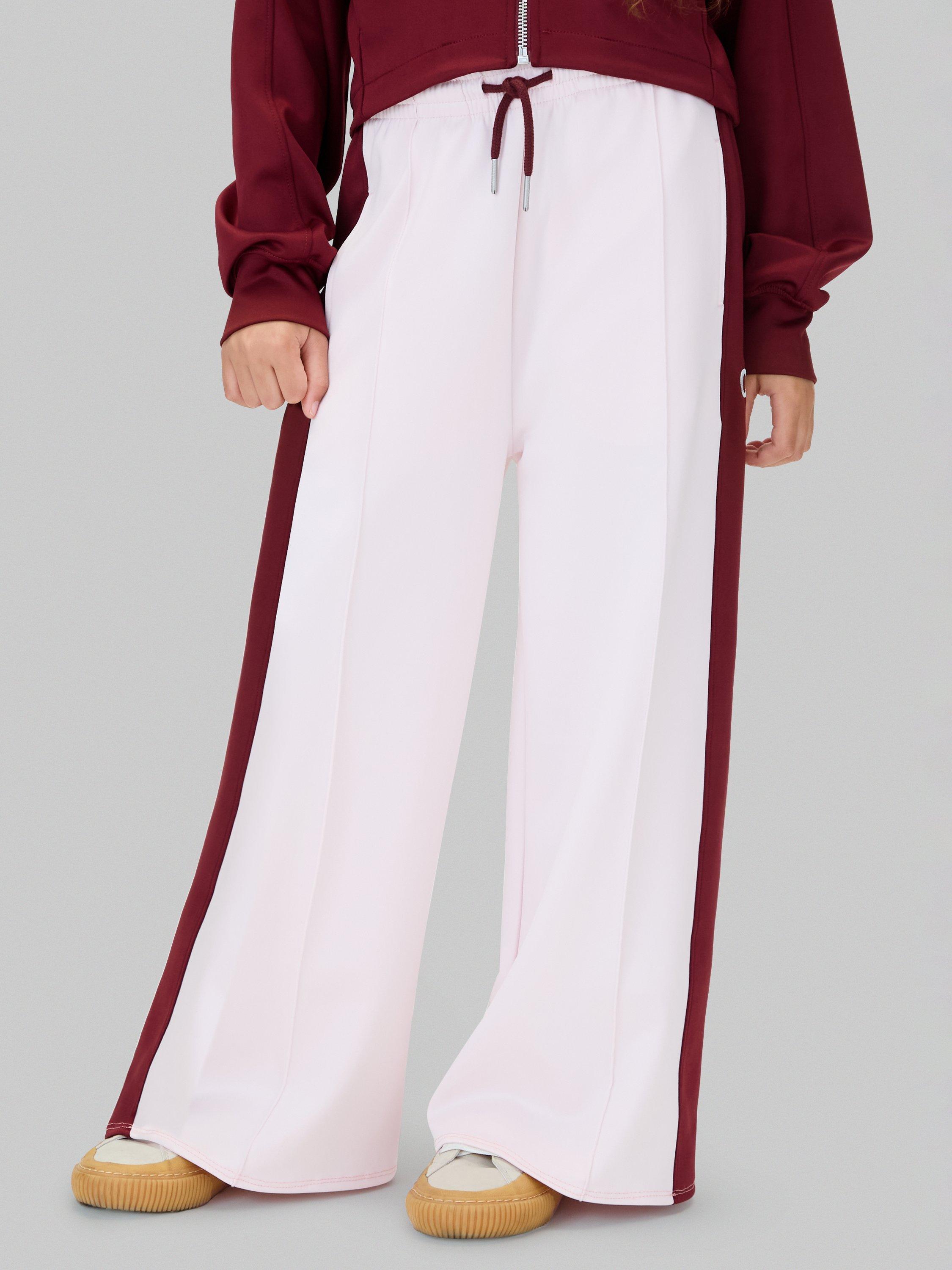 Product image 1 of 5, which shows Calvin Klein Kids' Colourblock Joggers, Light Lilac/Raspberry Chocolate, 8 years