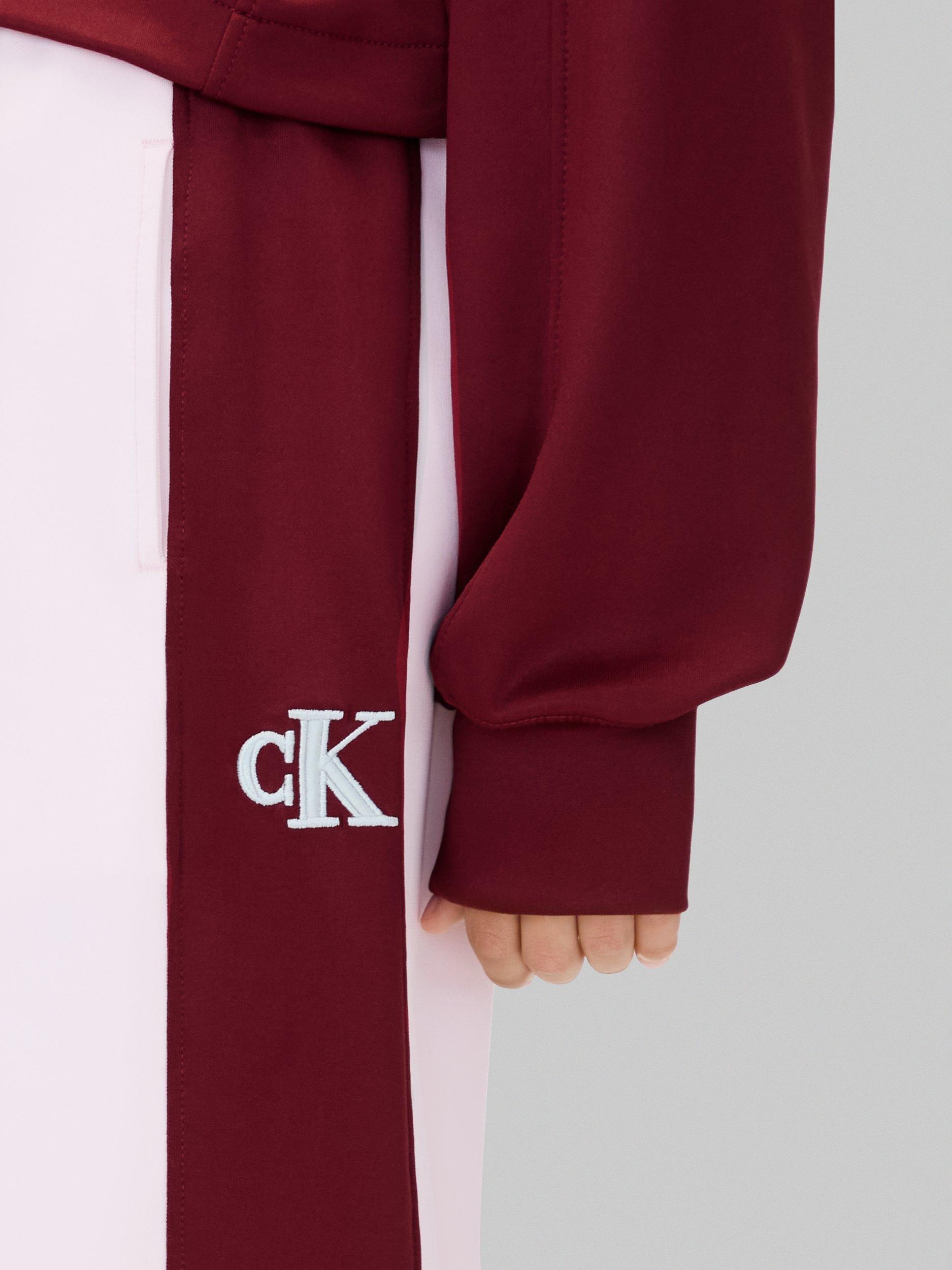 Product image 4 of 5, which shows Calvin Klein Kids' Colourblock Joggers, Light Lilac/Raspberry Chocolate, 8 years