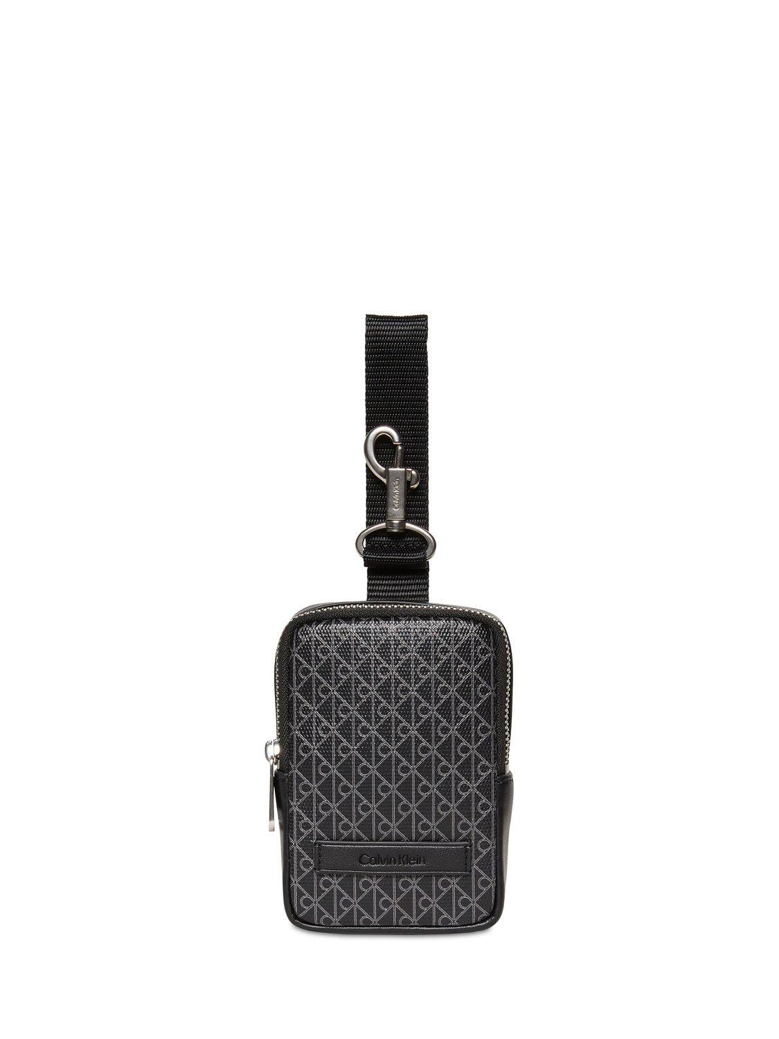 Product image 5 of 5, which shows Calvin Klein Monogram Logo Zip Pouch, Black, One Size