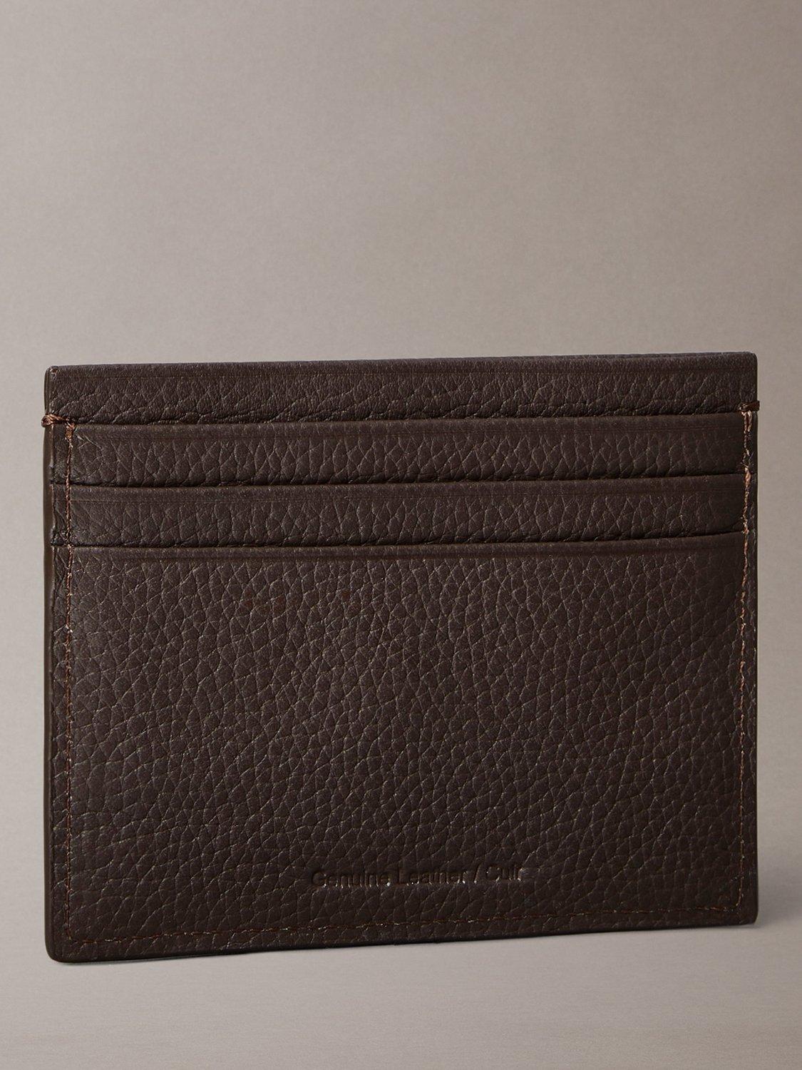 Product image 2 of 4, which shows Calvin Klein Embossed Logo Card Holder, Ck Dark Brown, One Size