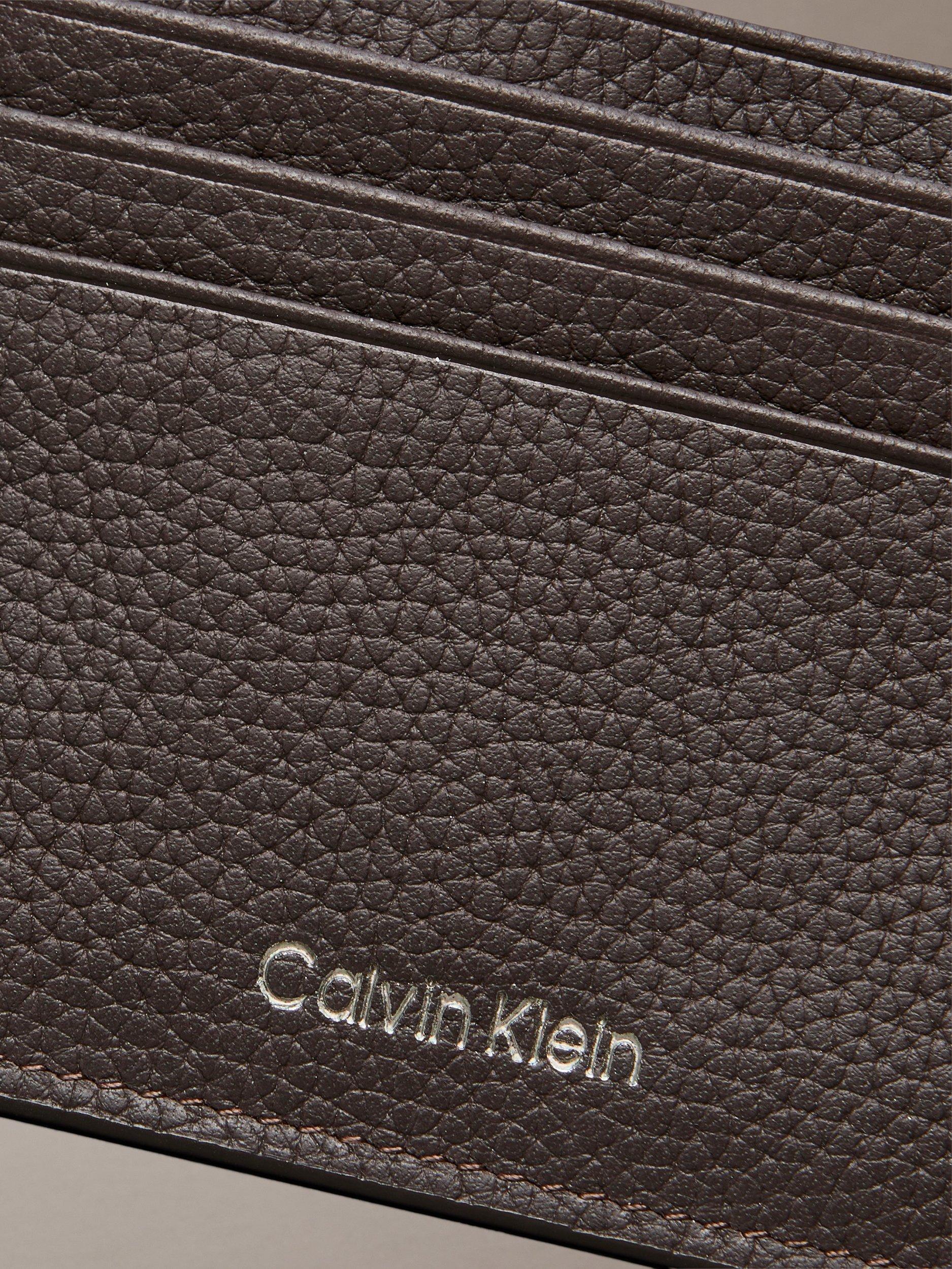 Product image 3 of 4, which shows Calvin Klein Embossed Logo Card Holder, Ck Dark Brown, One Size