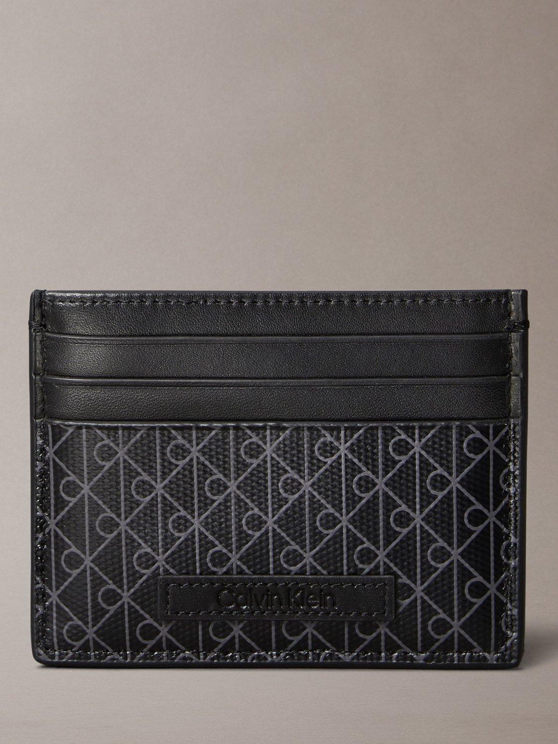 Product image 1 of 4, which shows Calvin Klein Monogram Logo Card Holder, Black, One Size