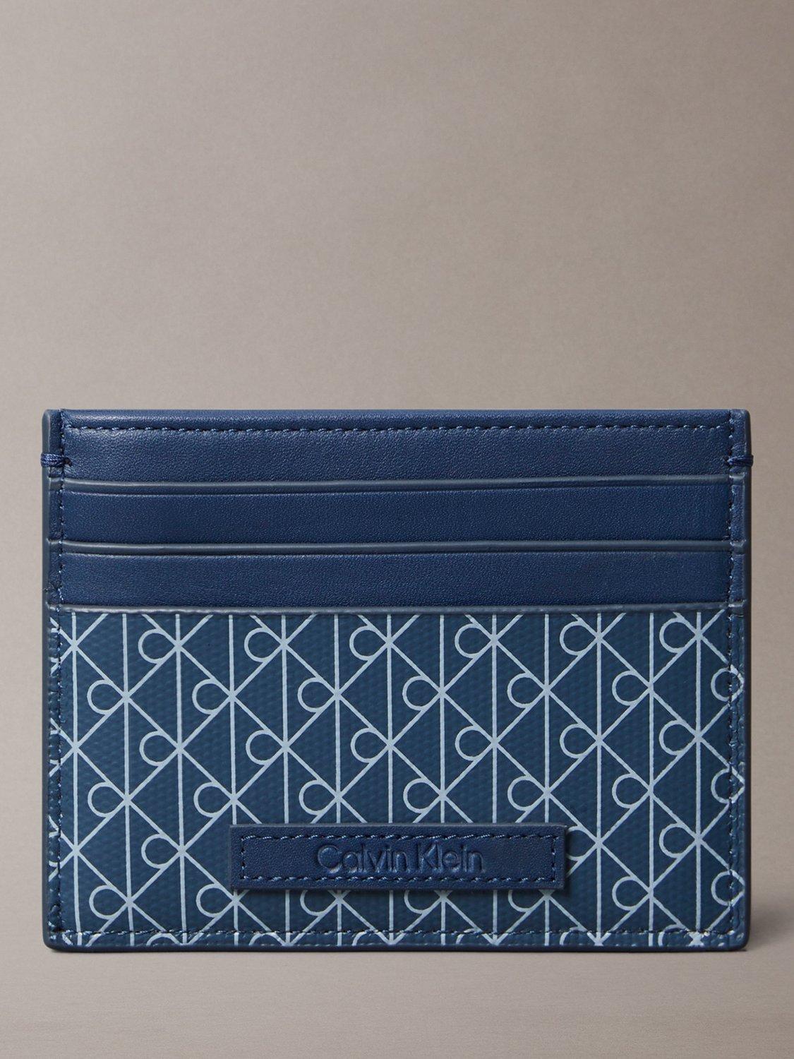 Product image 1 of 4, which shows Calvin Klein Monogram Logo Card Holder, Denim Blue, One Size