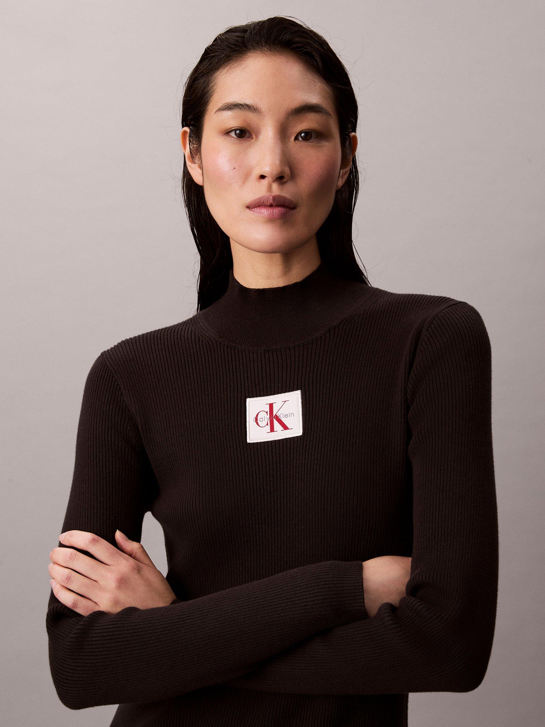 Product image 4 of 6, which shows Calvin Klein Logo Roll Neck Ribbed Dress, Black, XXS