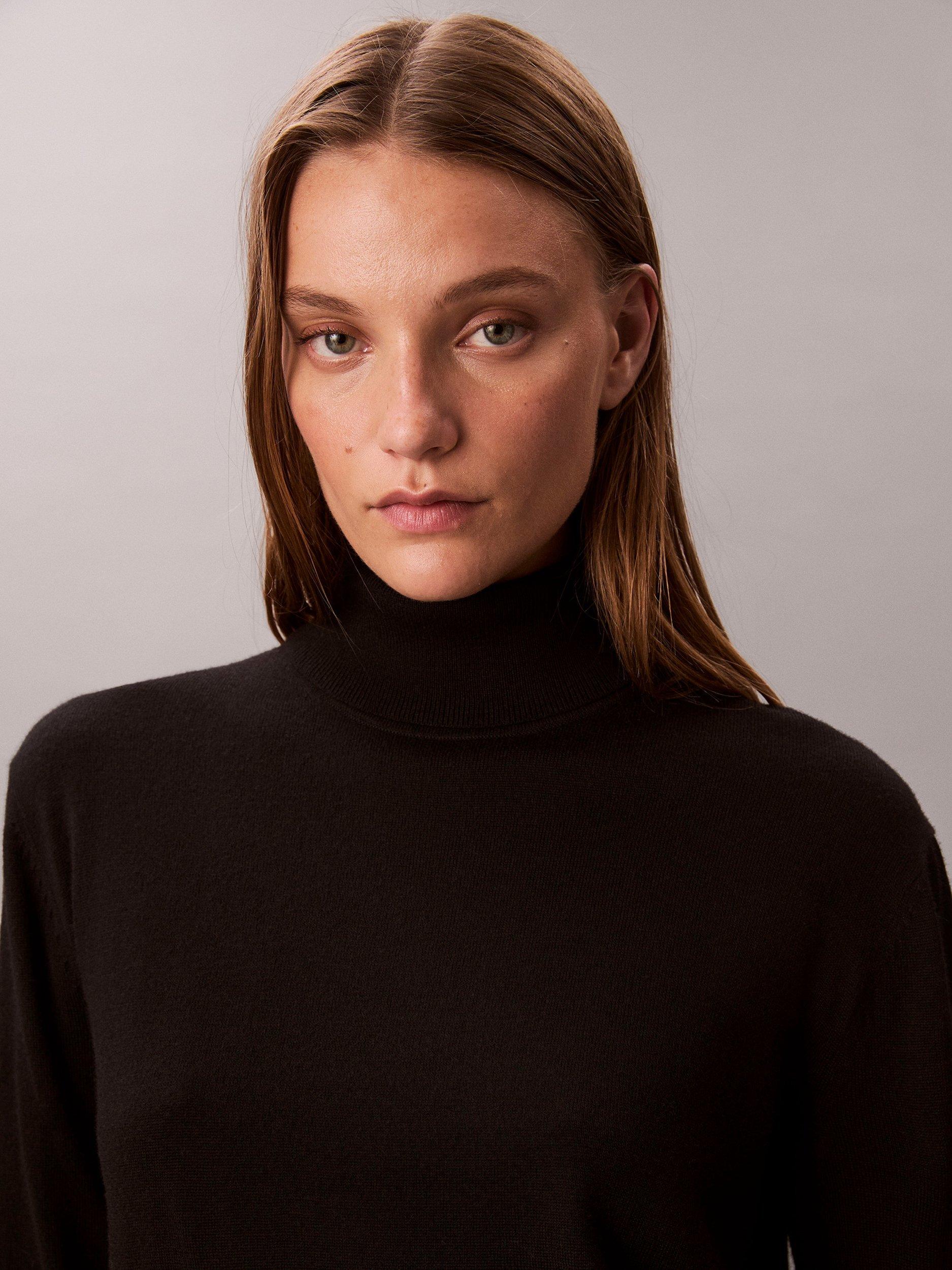 Product image 4 of 7, which shows Calvin Klein Merino Wool Blend Roll Neck Jumper, Black, XS