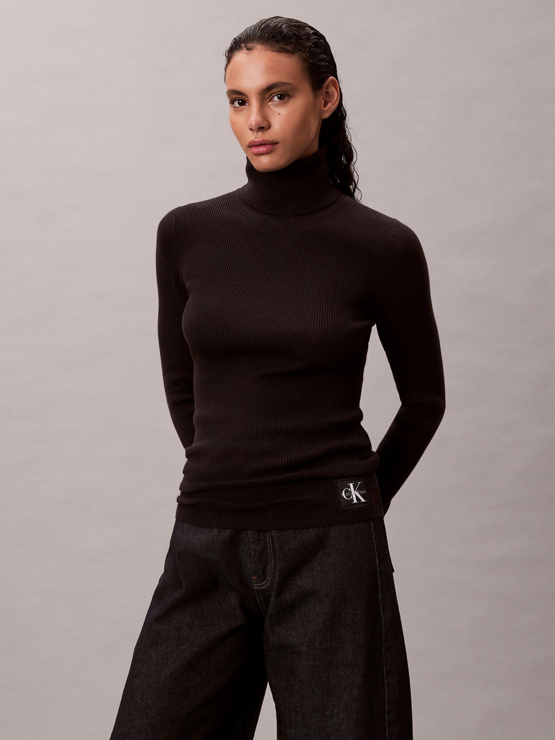 Product image 1 of 5, which shows Calvin Klein Woven Label Roll Neck Top, Black, M