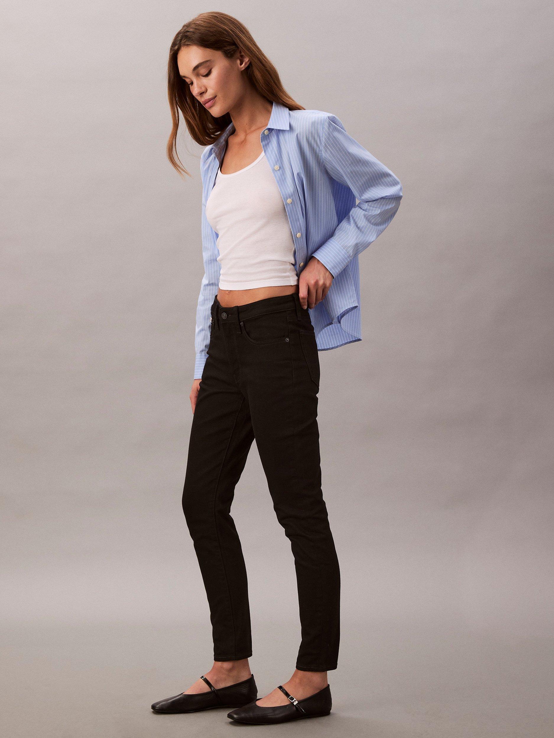 Product image 3 of 7, which shows Calvin Klein Mid Rise Skinny Jeans, Classic Black, 25R