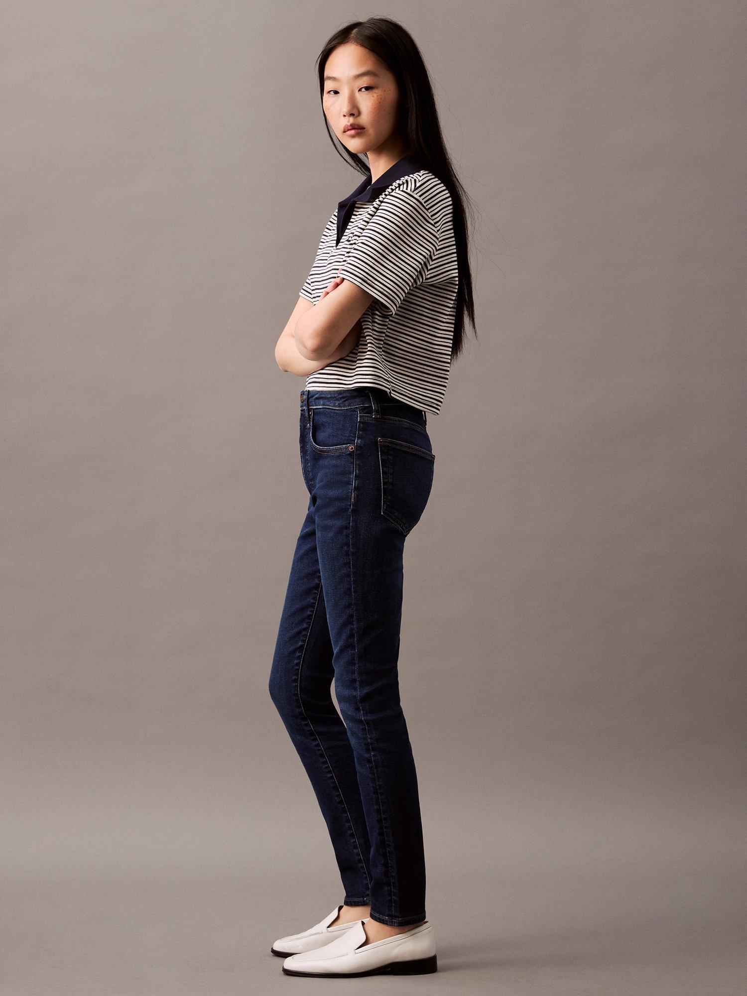 Product image 4 of 7, which shows Calvin Klein Mid Rise Skinny Jeans, Blue Orbit, 25R