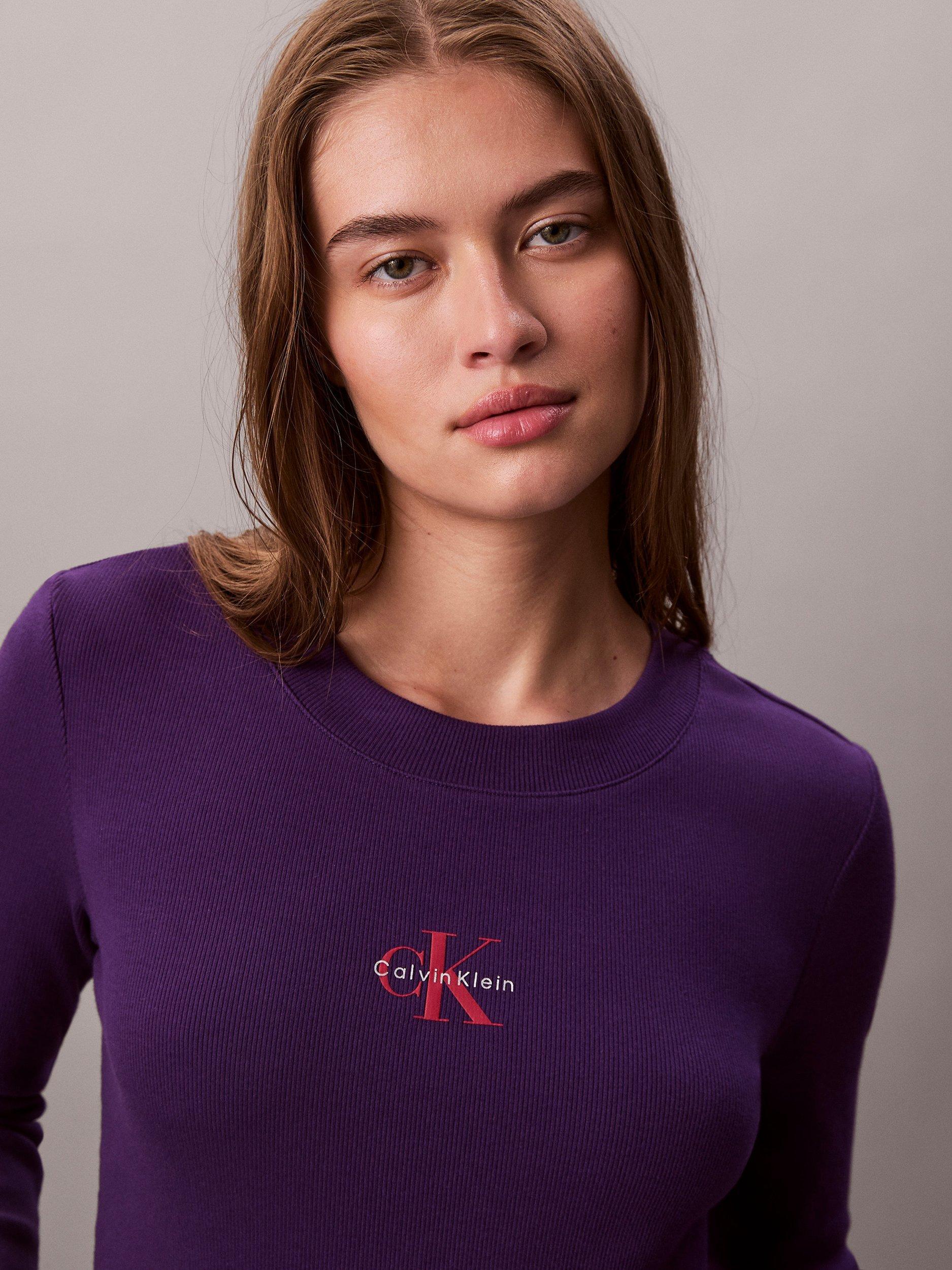 Product image 3 of 6, which shows Calvin Klein Monogram Logo Long Sleeve Baby Top, Acai, XXS