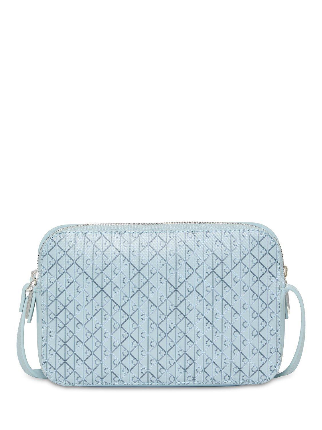 Product image 1 of 2, which shows Calvin Klein Monogram Logo Camera Bag, Palest Blue, One Size
