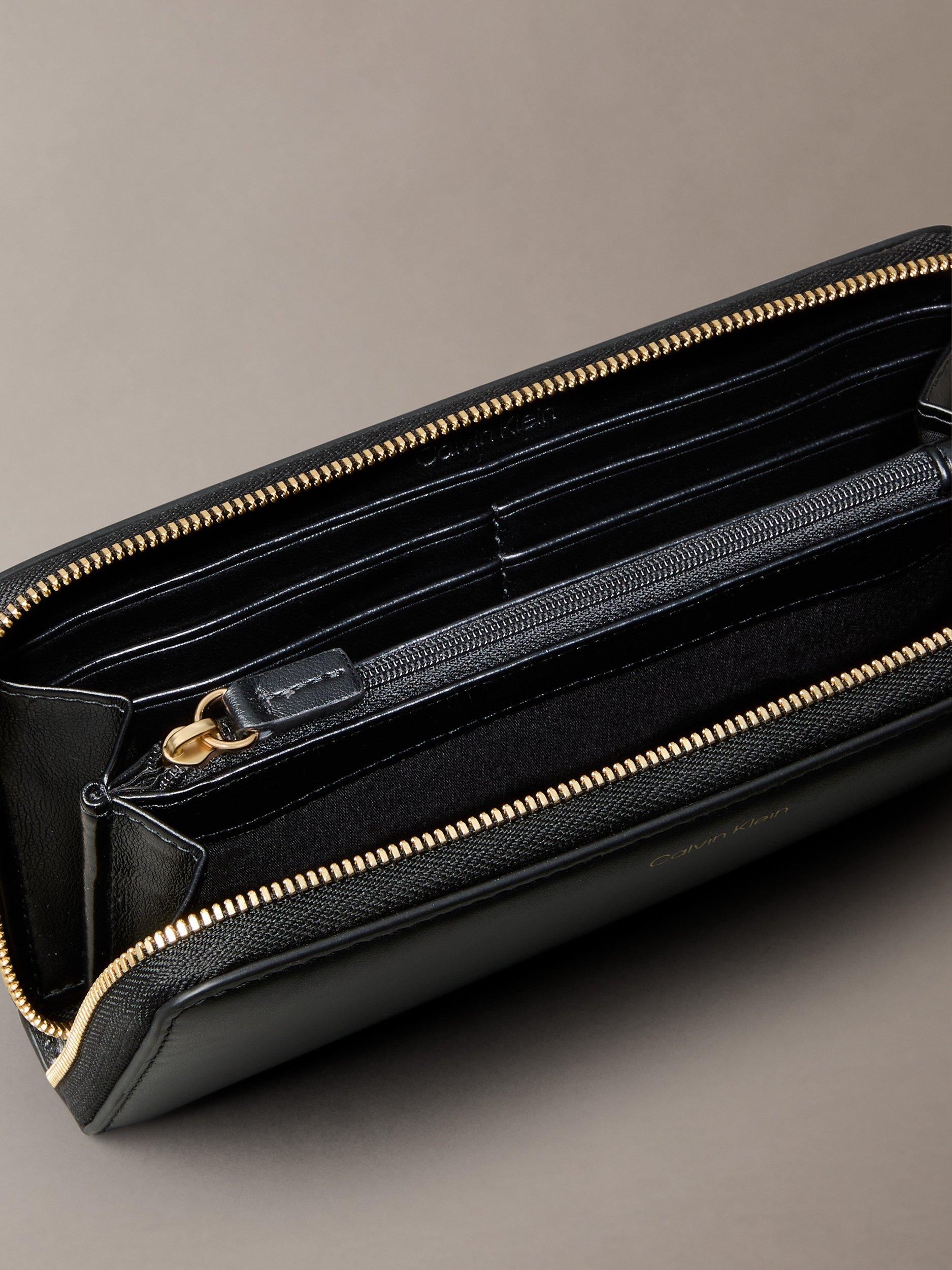 Product image 3 of 3, which shows Calvin Klein Large Leather Zip Wallet, Black, One Size